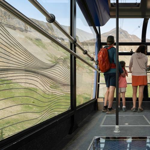 Family on the Lone Peak Tram in summer