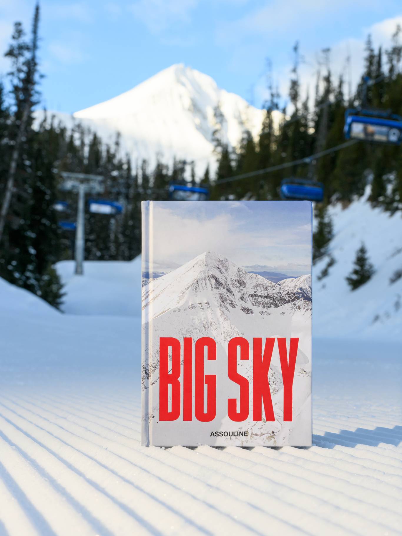 Big Sky Resort Assouline Book on a groomed run