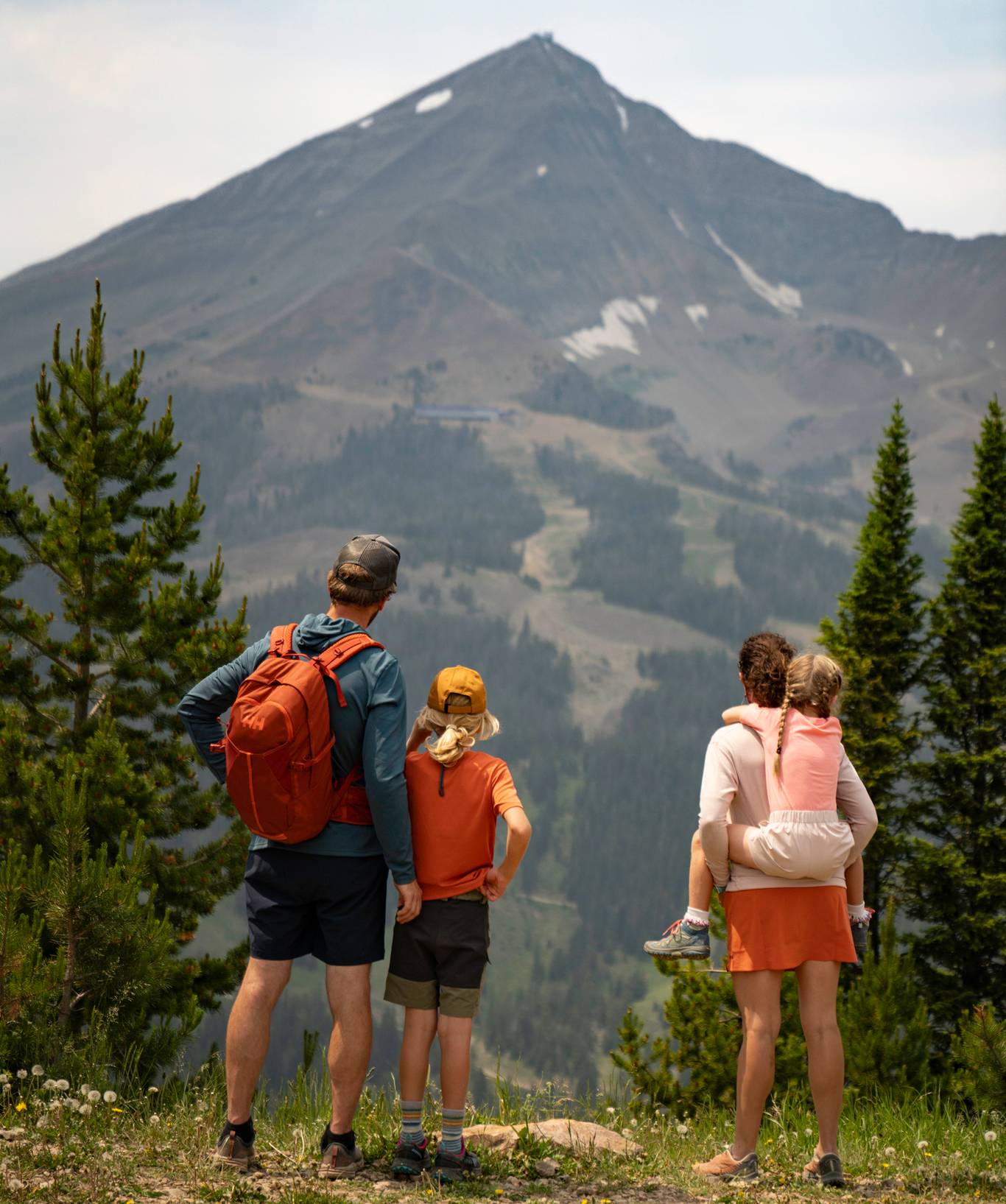 Family on a guided hike at Big Sky Resort