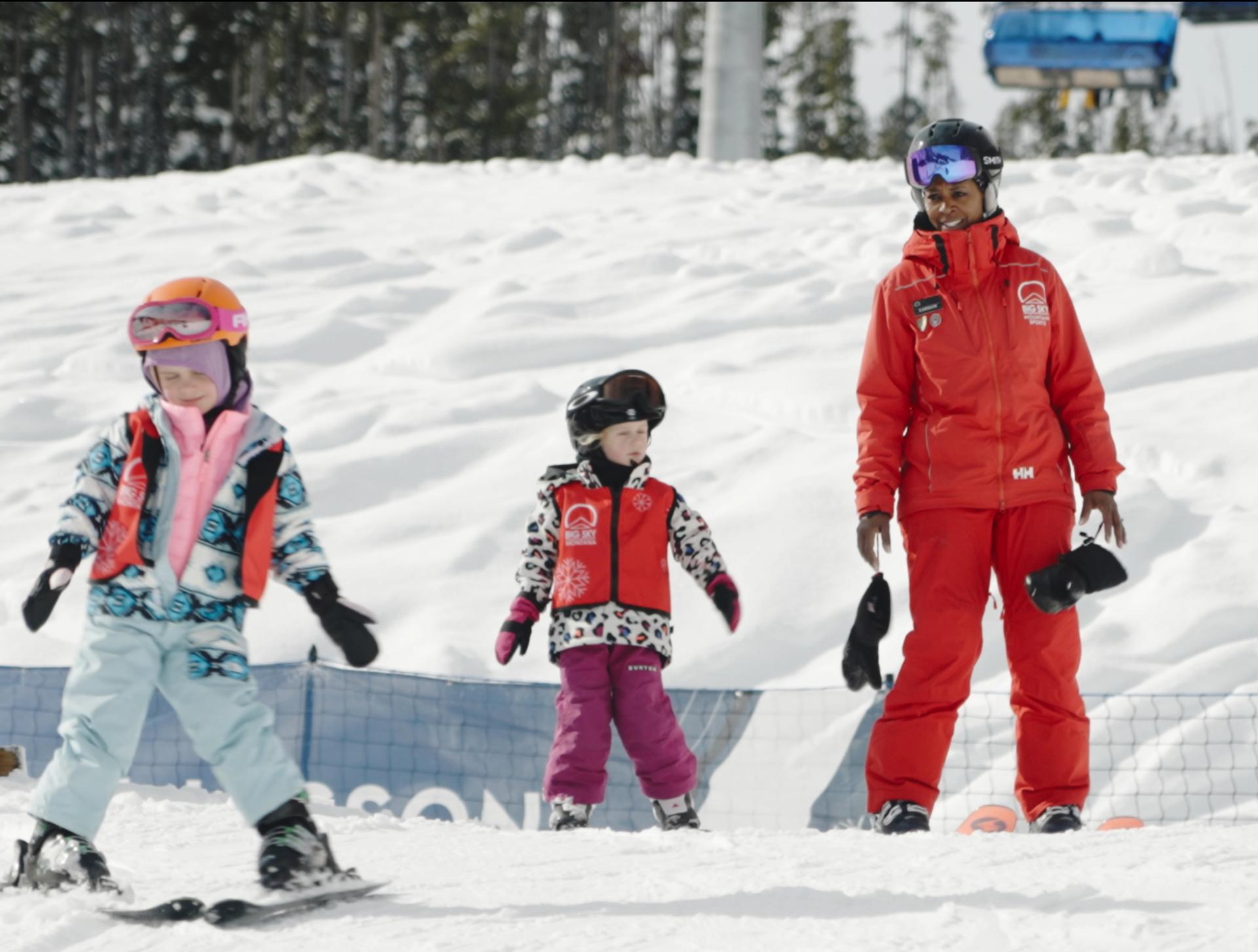 Carolyn Stempler teaching young ski students