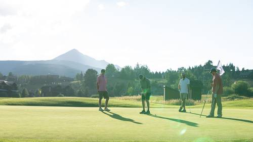 Golfers on a green