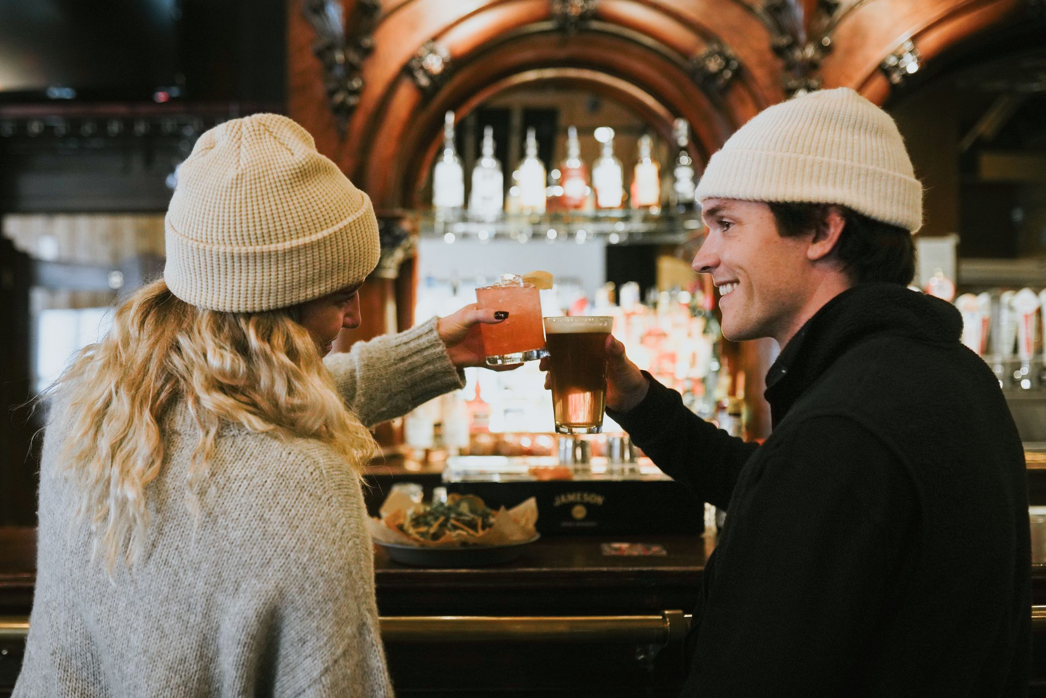 People cheersing drinks