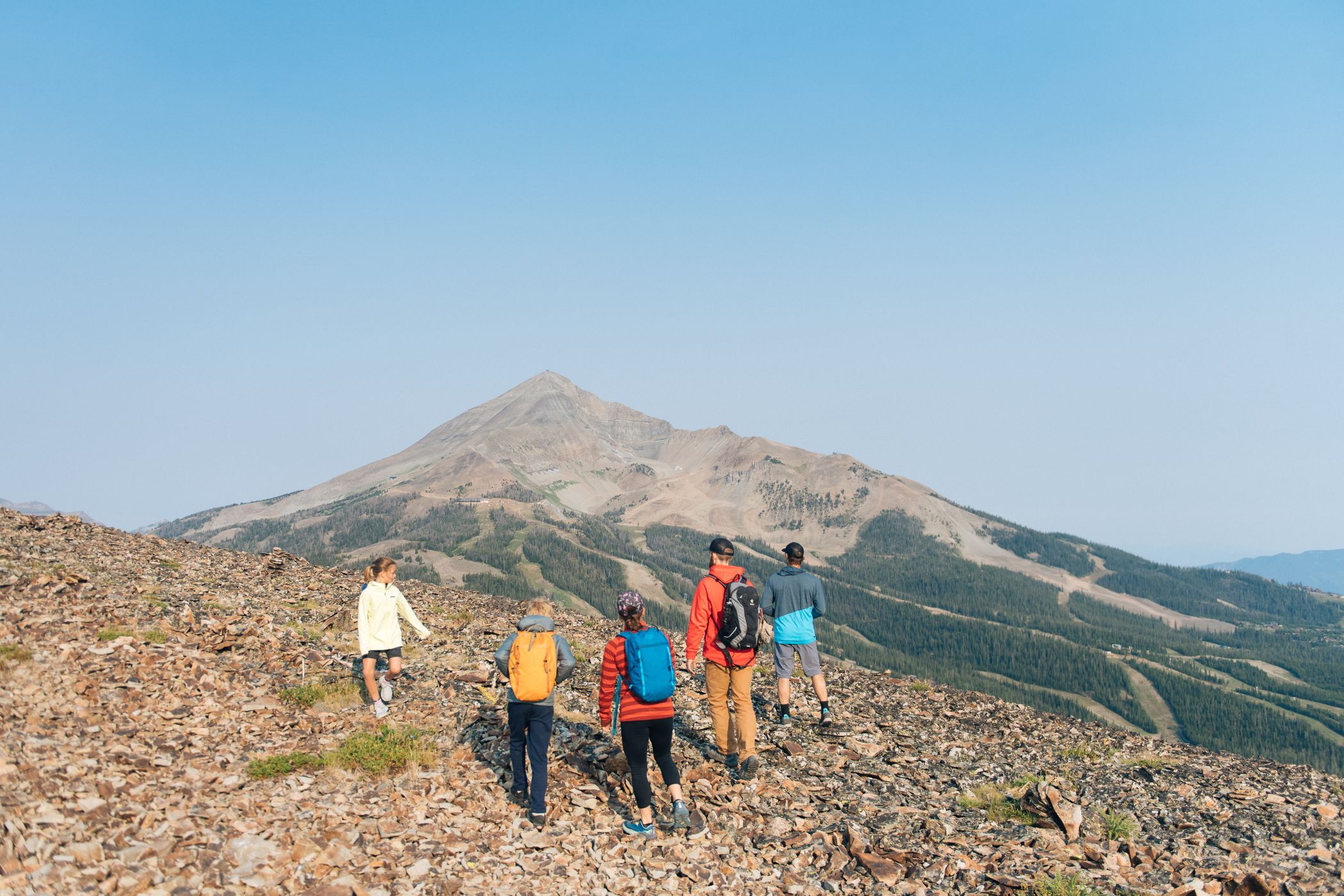 Family on a hike at Big Sky Resort