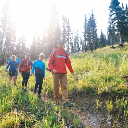 Family and guide on a hike