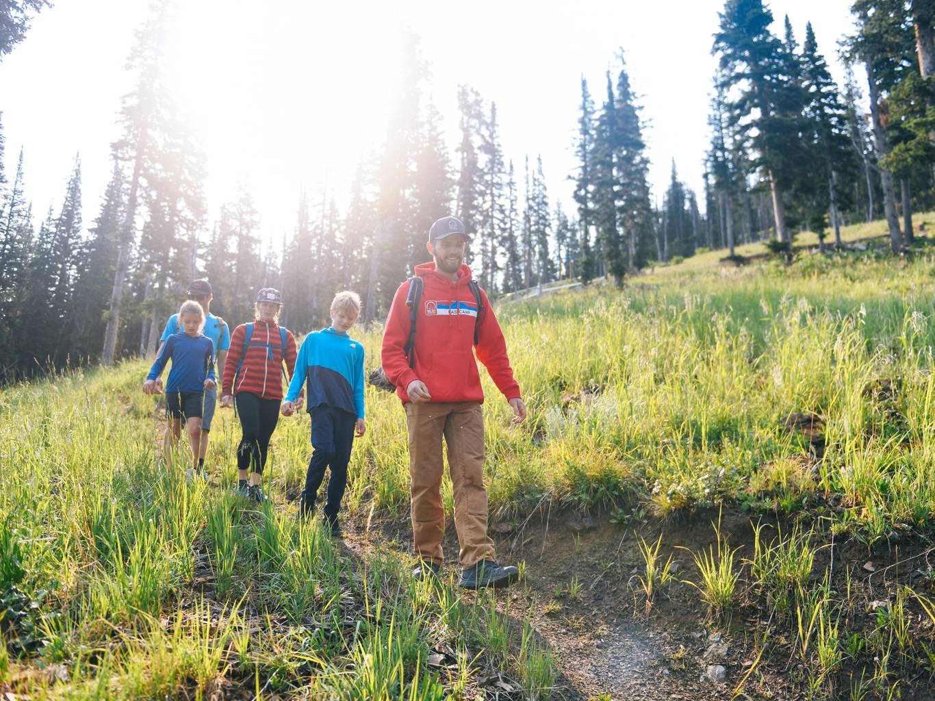 Family and guide on a hike