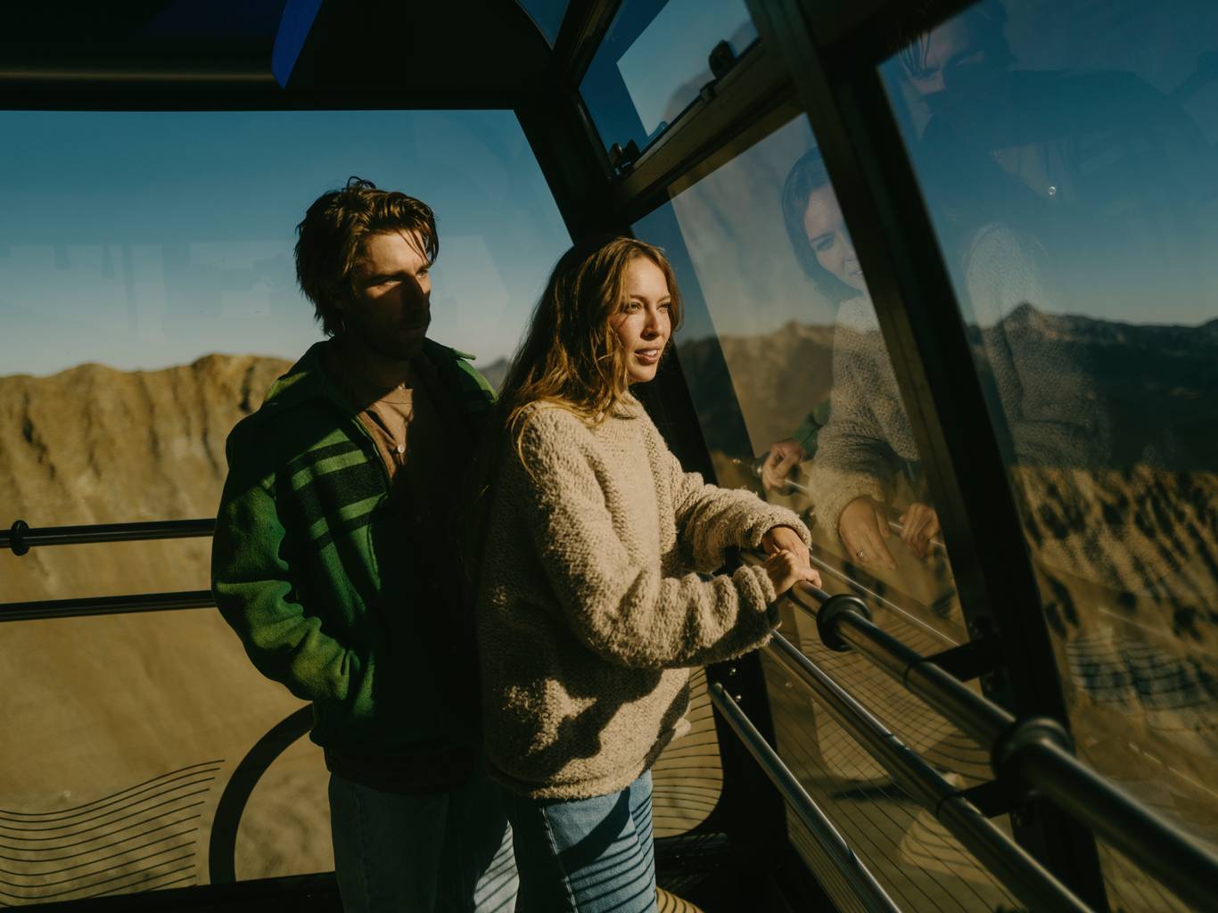 Couple on the Lone Peak Tram in the summer
