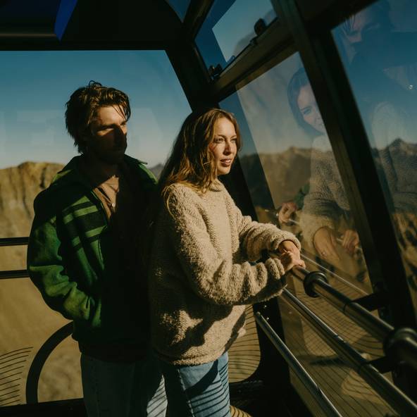 Couple on the Lone Peak Tram in summer