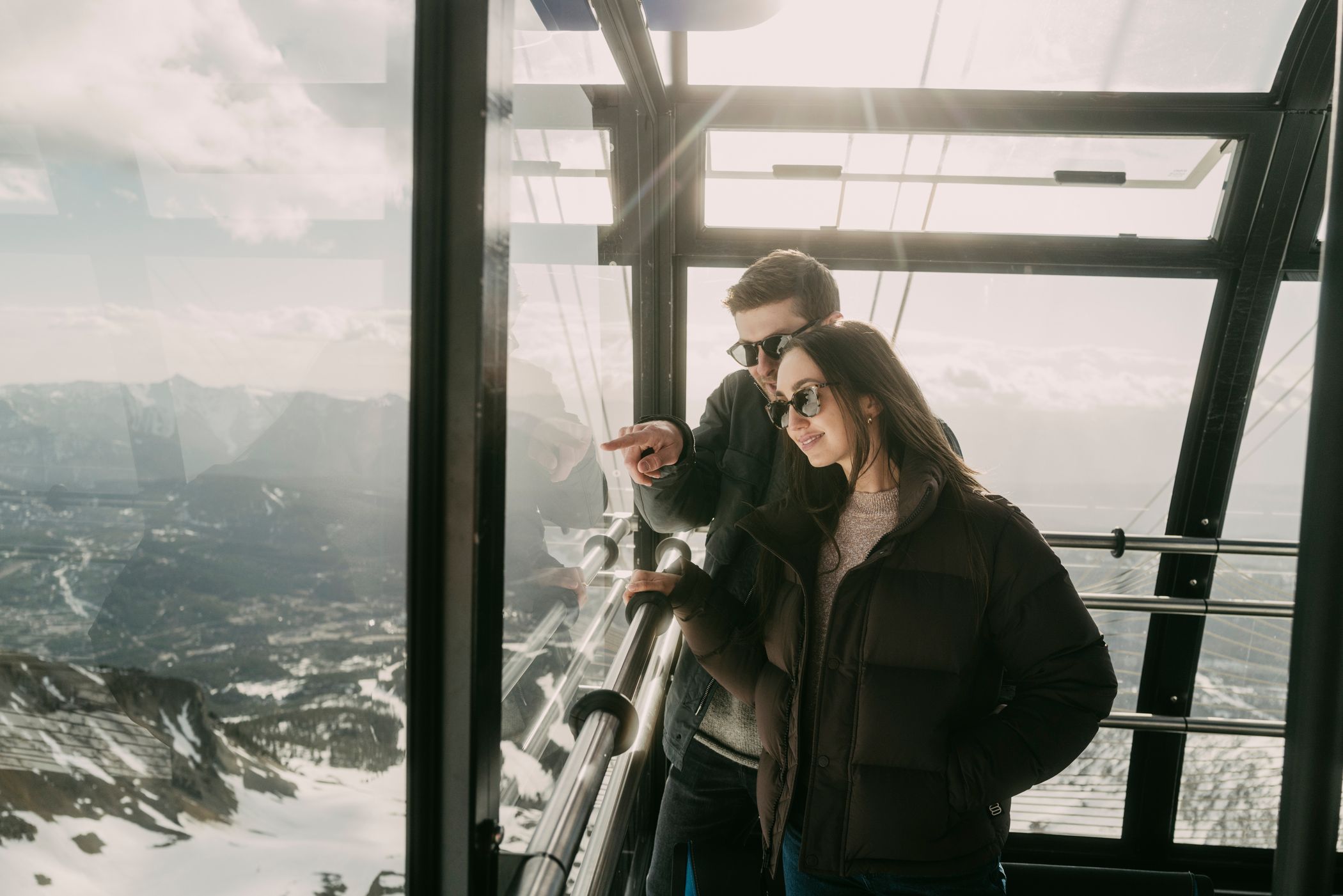 Couple in the Lone Peak Tram in winter