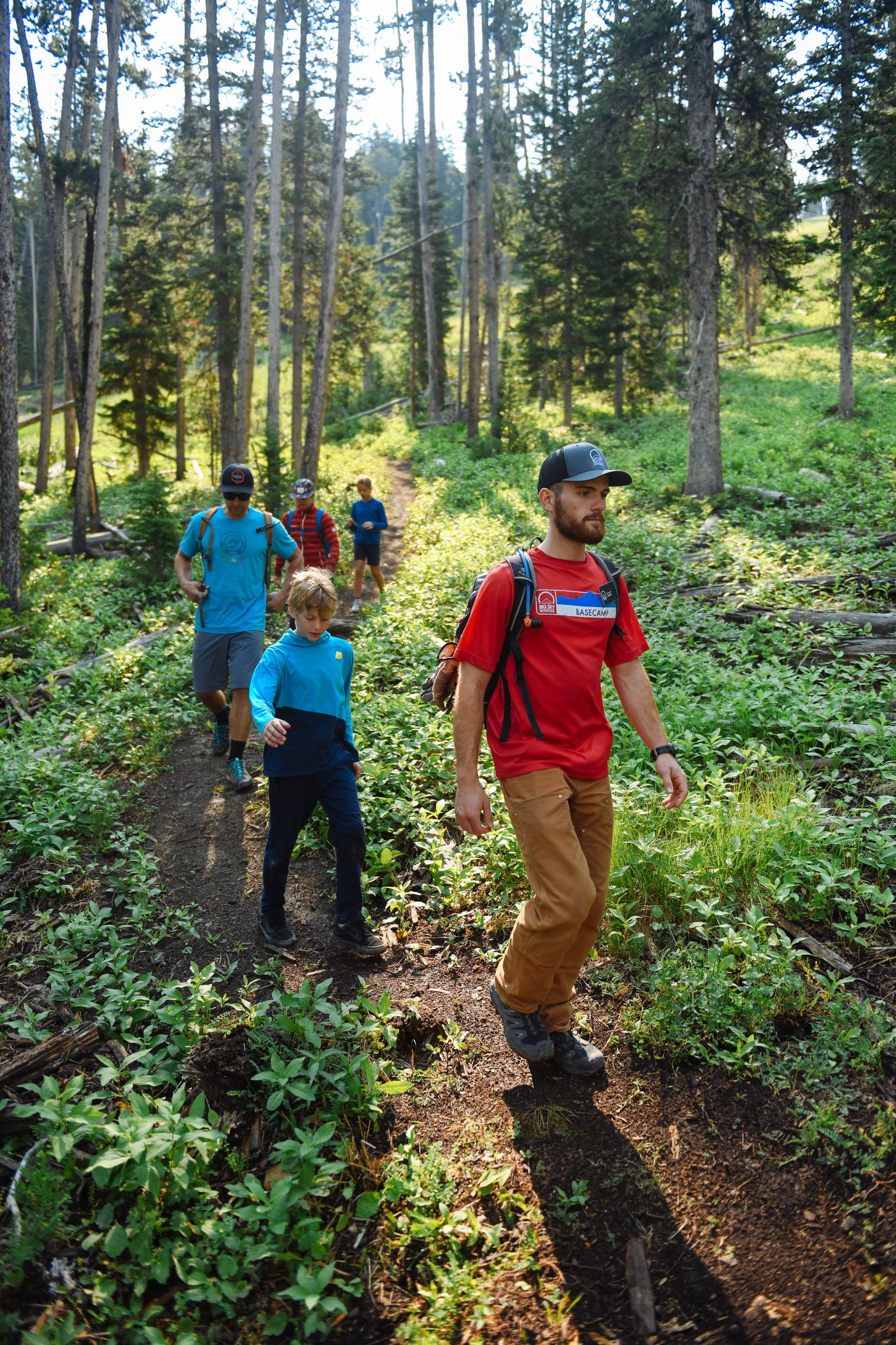 Family hiking through woods