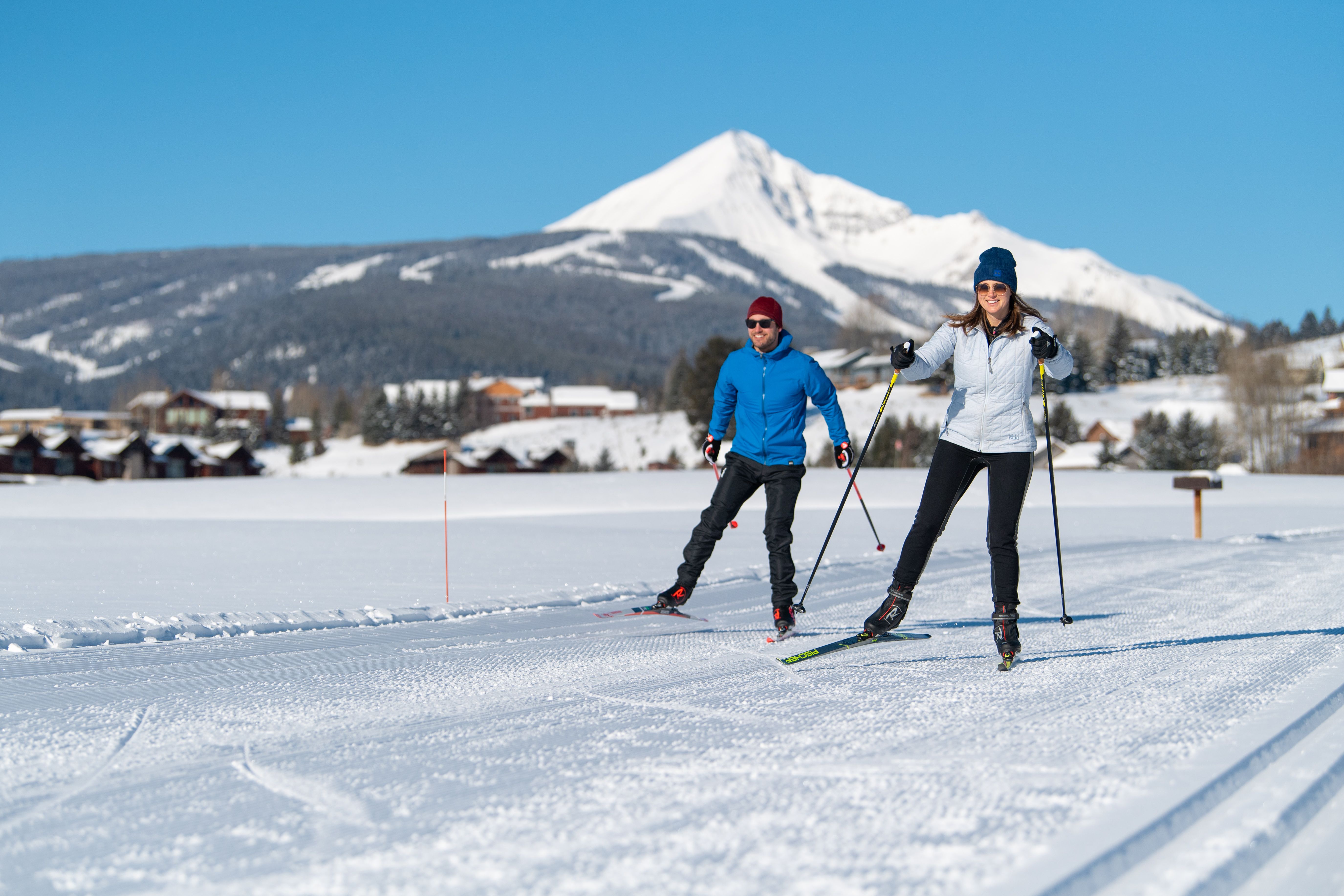 Skate skiers at the Big Sky Resort Nordic Center