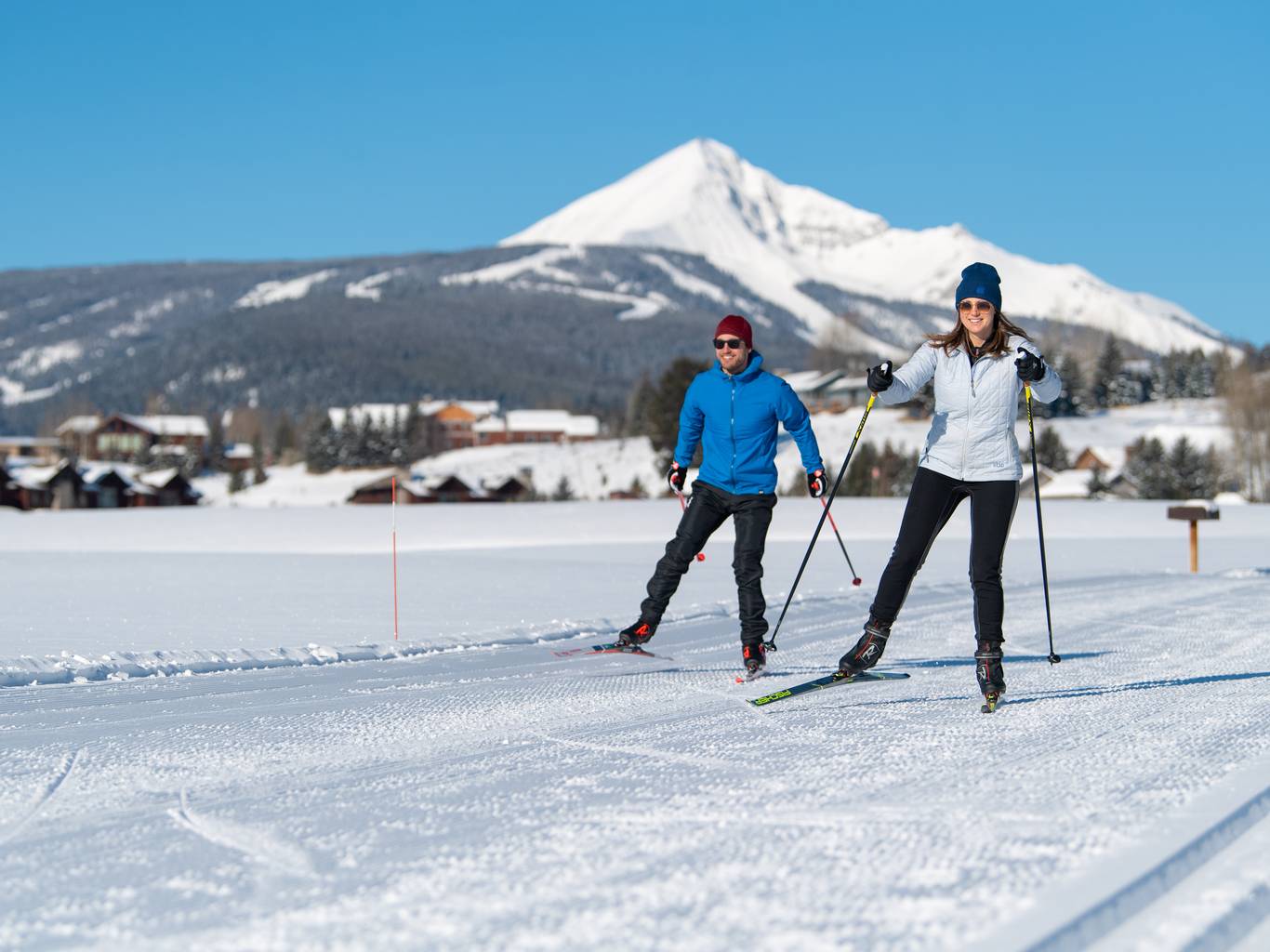 Skate skiers at the Big Sky Resort Nordic Center