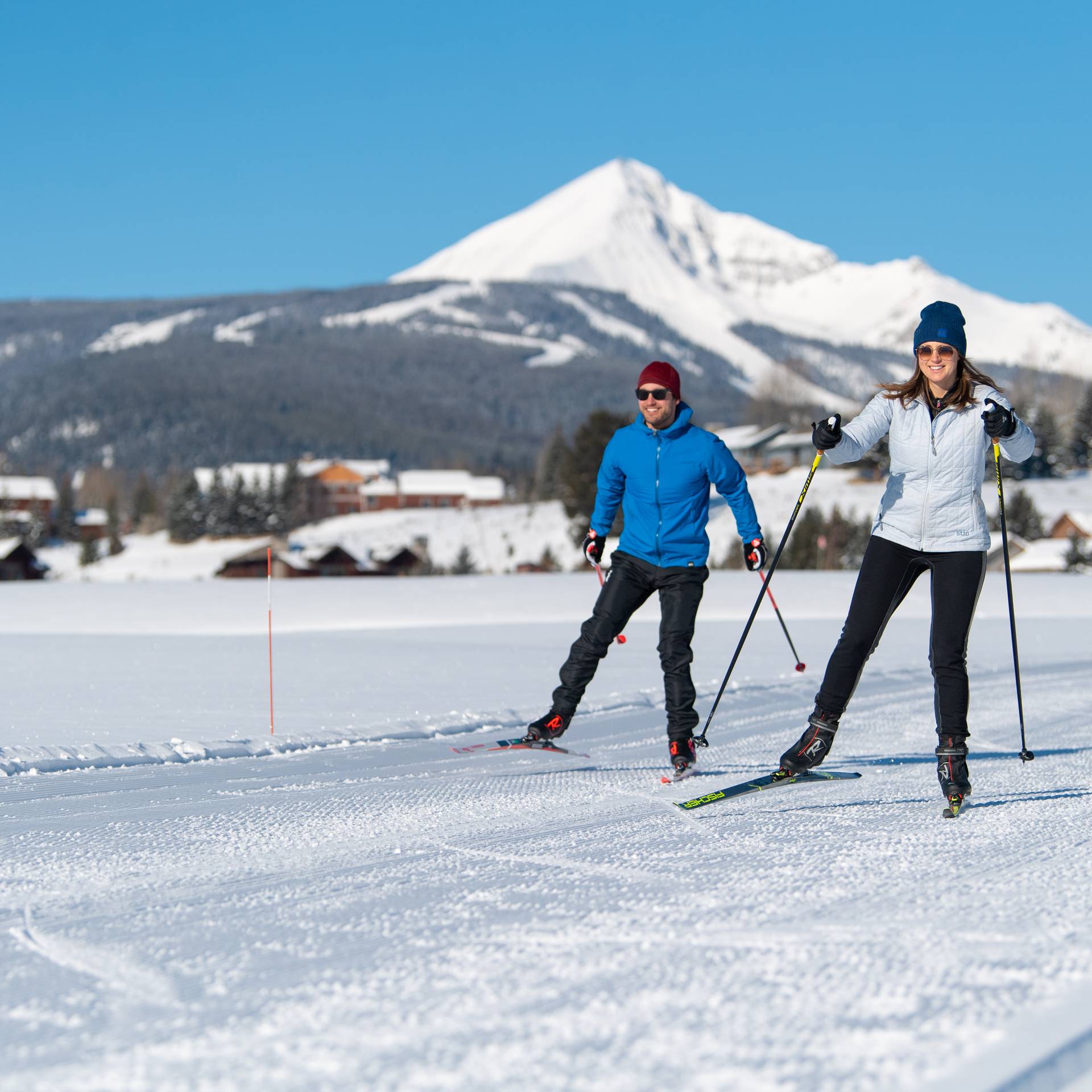 Skate skiers at the Big Sky Resort Nordic Center