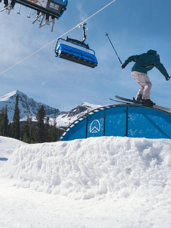 Swift Current 6 and a skier in a terrain park