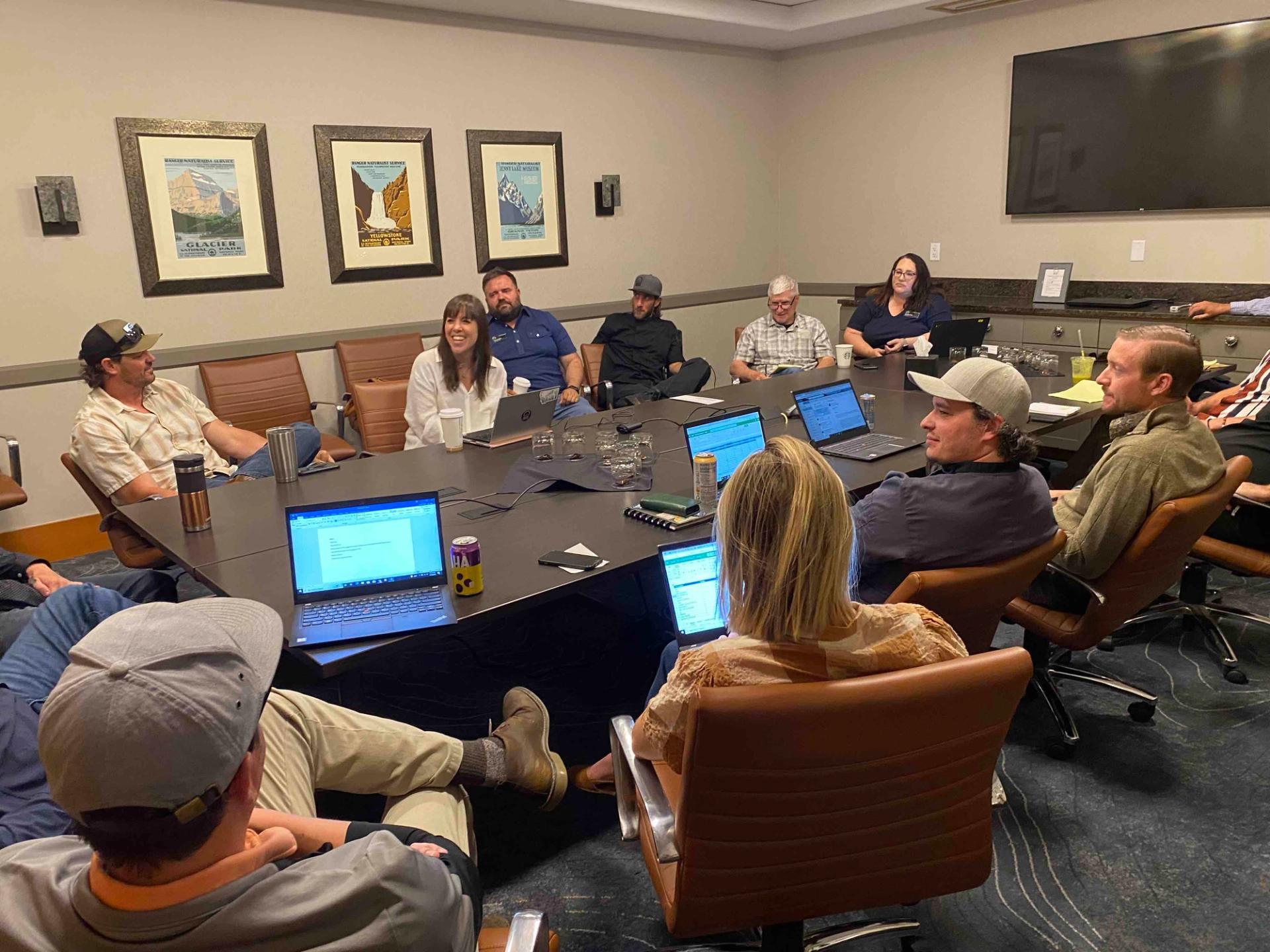 MJ visits with other Food and Beverage coworkers at a meeting