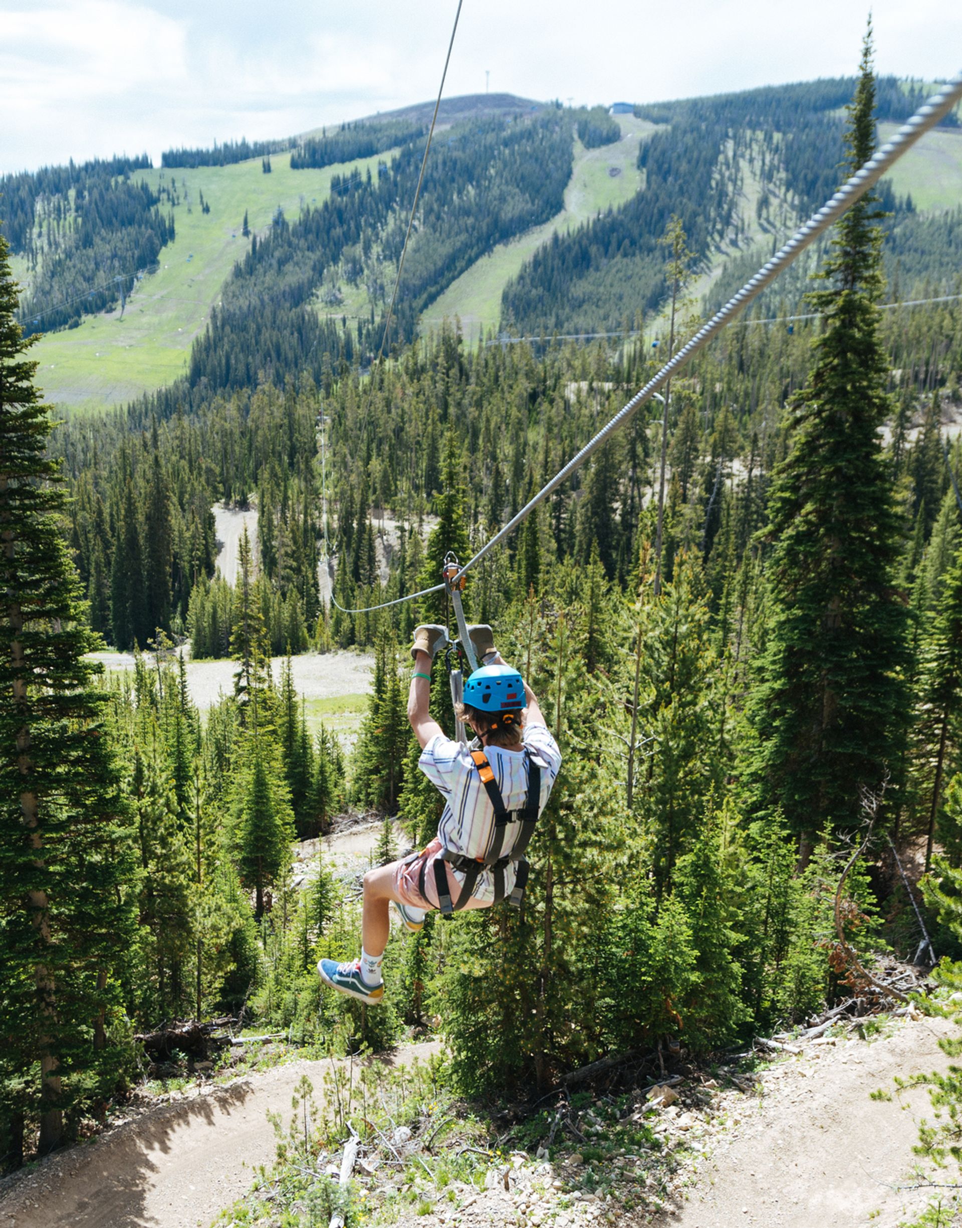 Kid on a long zipline