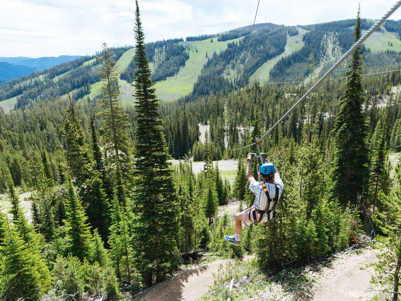 Person on a zipline at Big Sky Resort