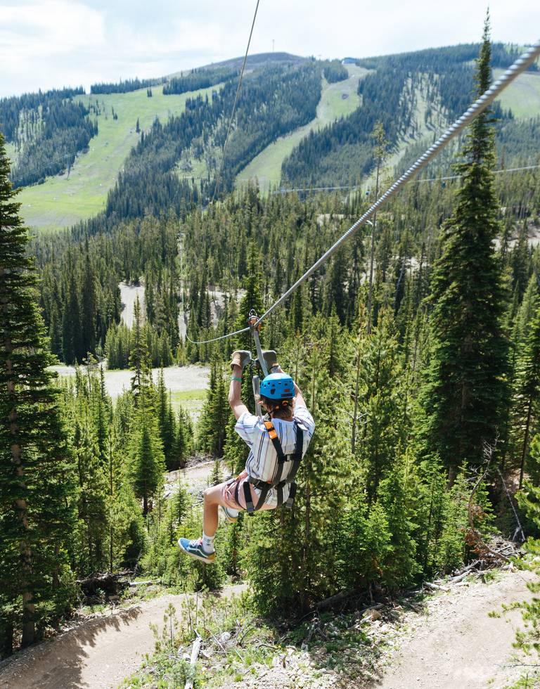 Kid on a long zipline