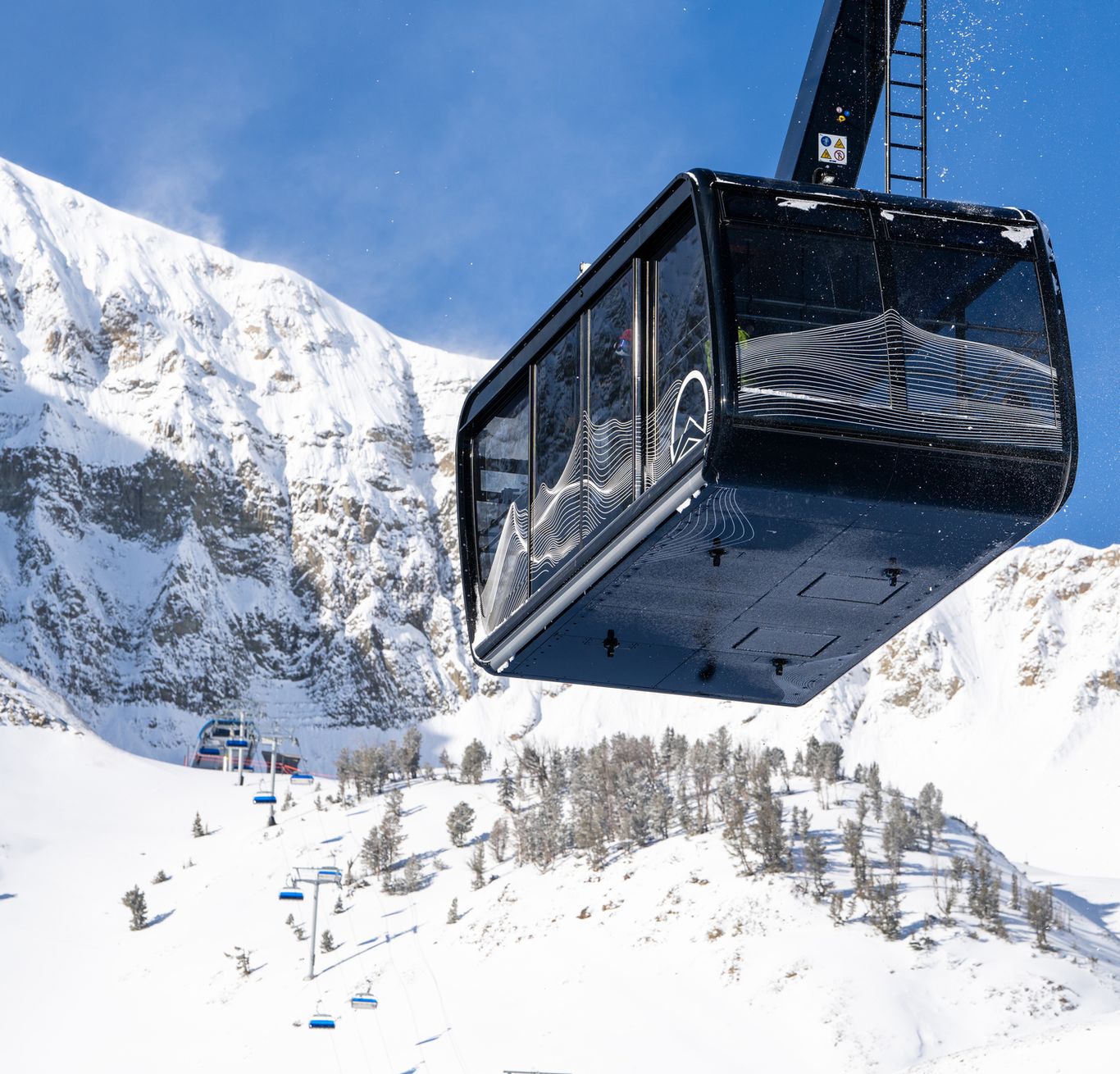 Lone Peak Tram cabin with Powder Seeker 6 in the background