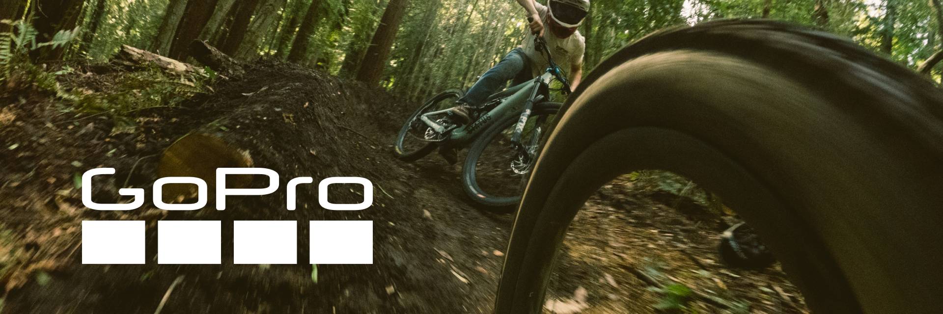 Photo of a mountain biker with the GoPro logo overlaid