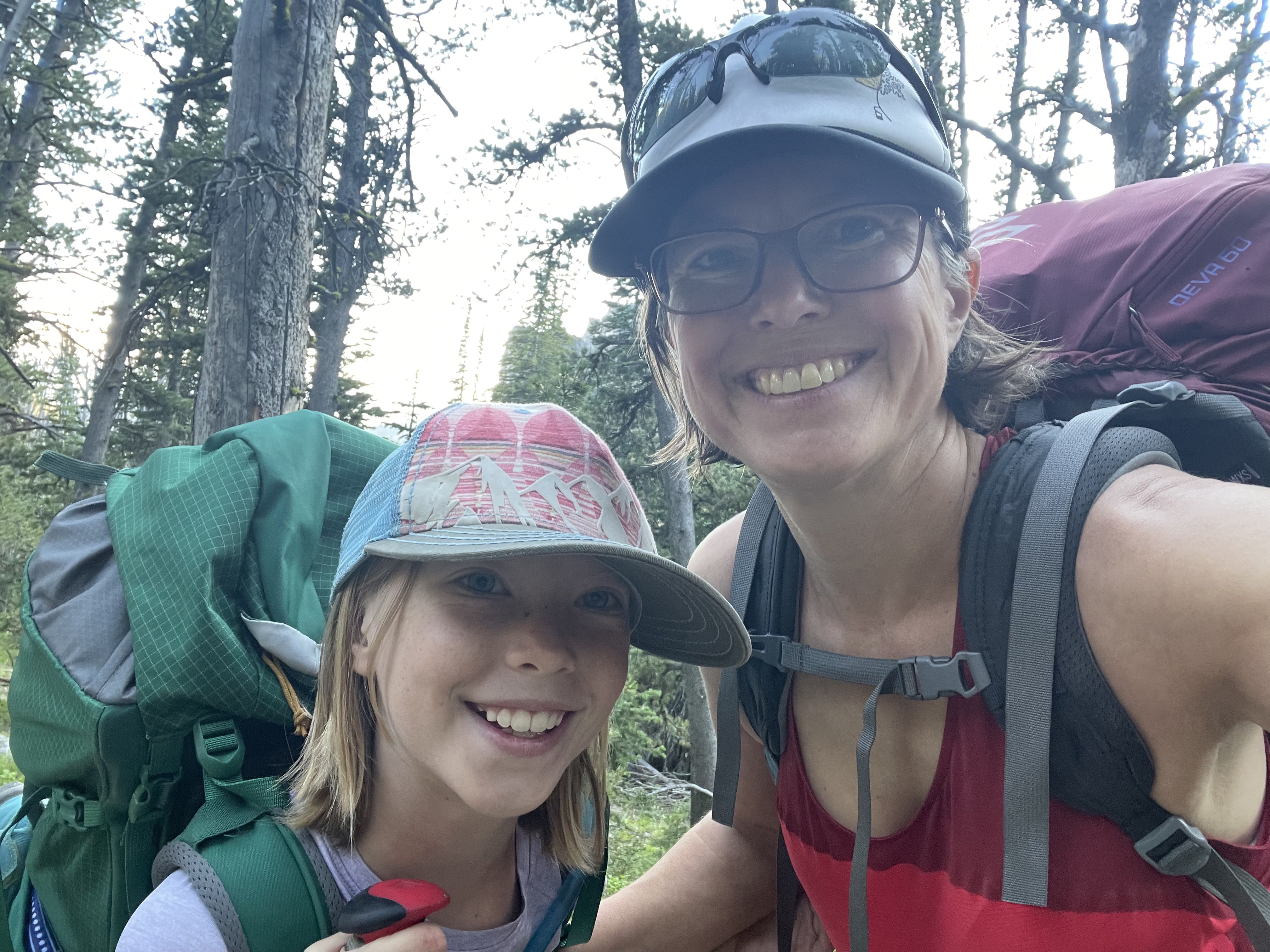 Christine and her daughter in backpacking gear