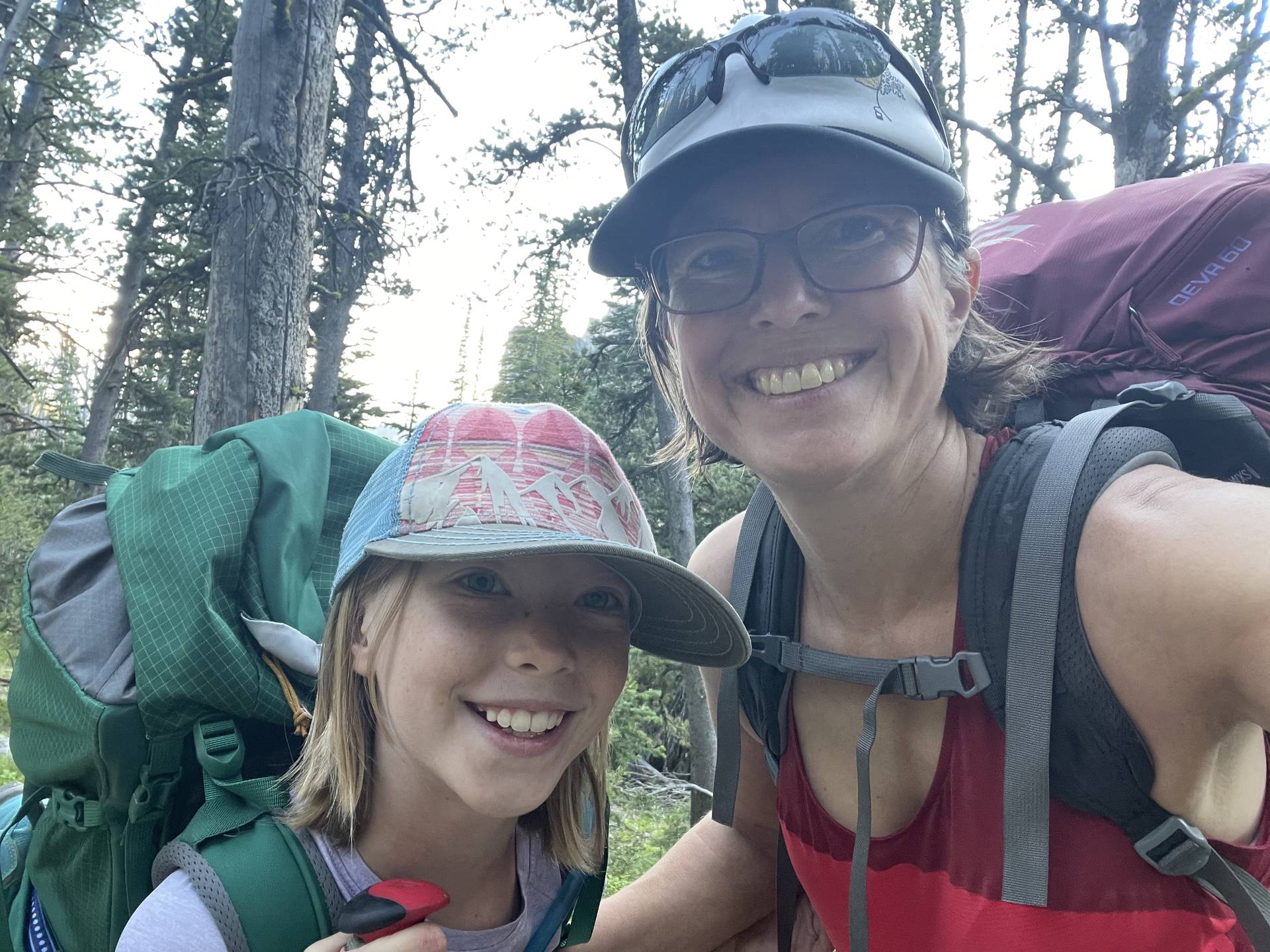 Christine and her daughter in backpacking gear