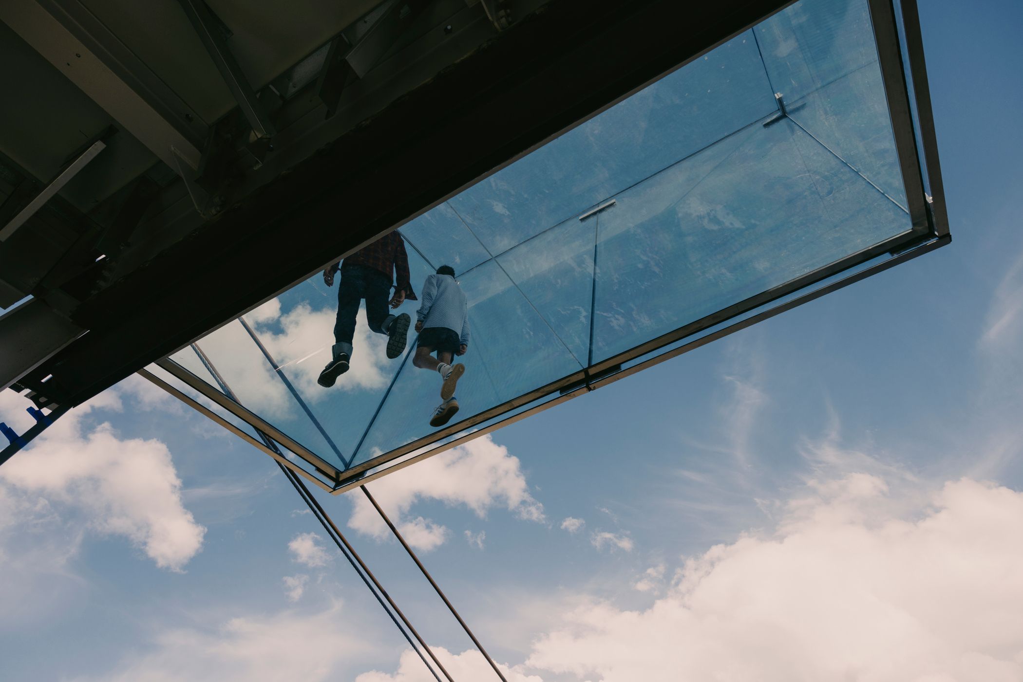 People walking on the glass floor at Kircliff