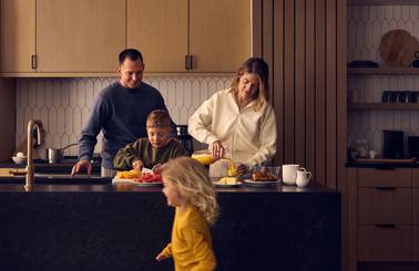 Family making breakfast in a vacation rental