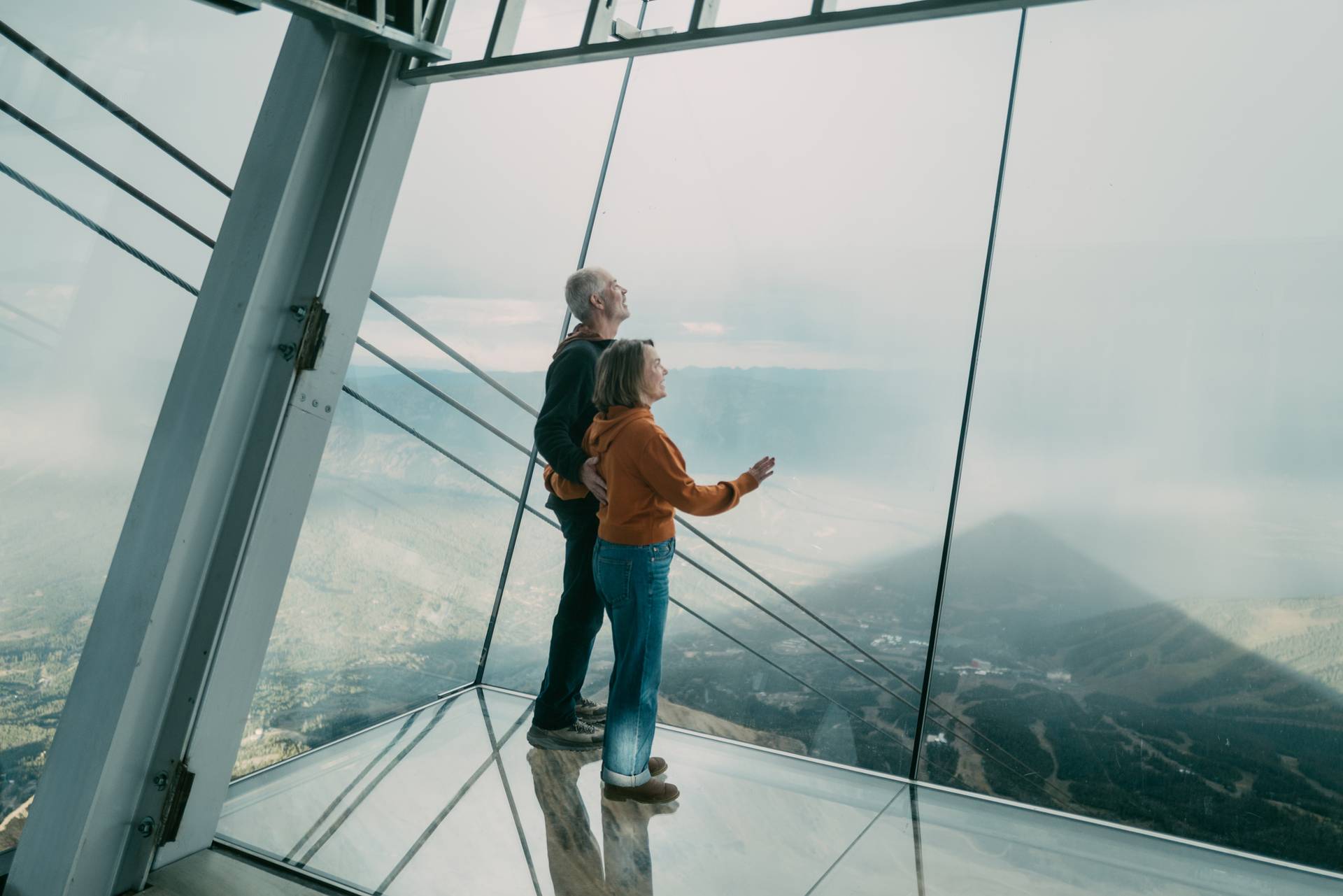 Couple looking out from Kircliff in summer