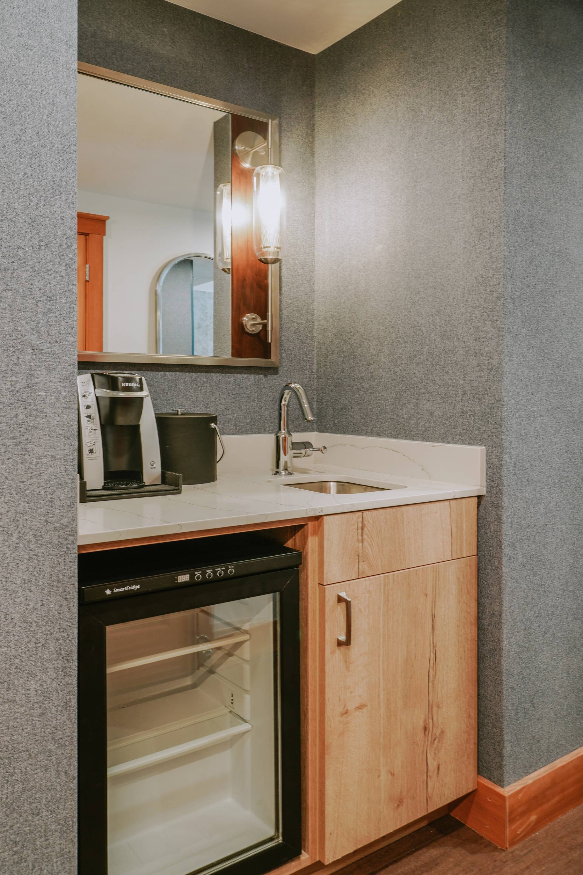 Summit Hotel King hotel room mini fridge and sink