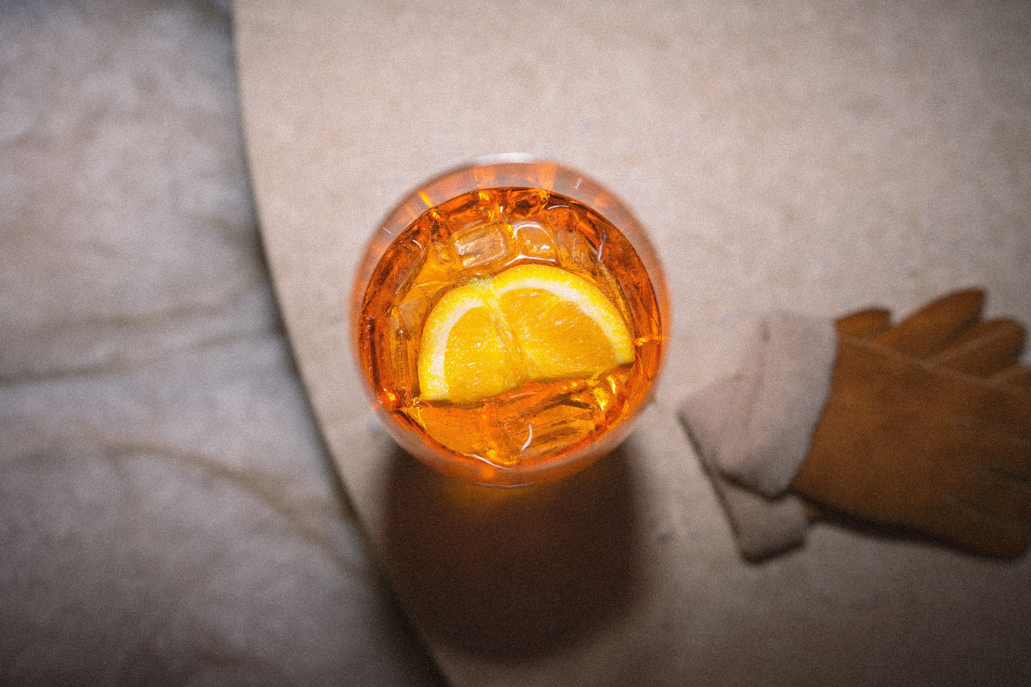 Cocktail next to a pair of gloves at the Iglu