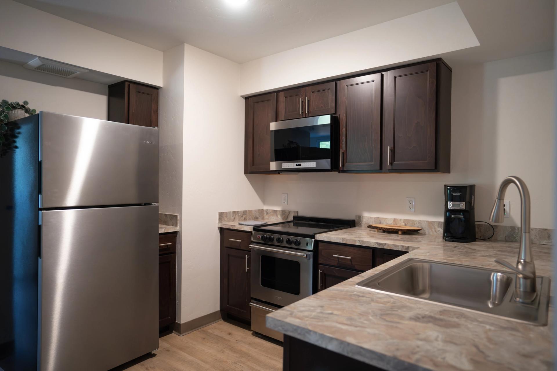 A kitchen in one of the Levinski Lodge apartment units