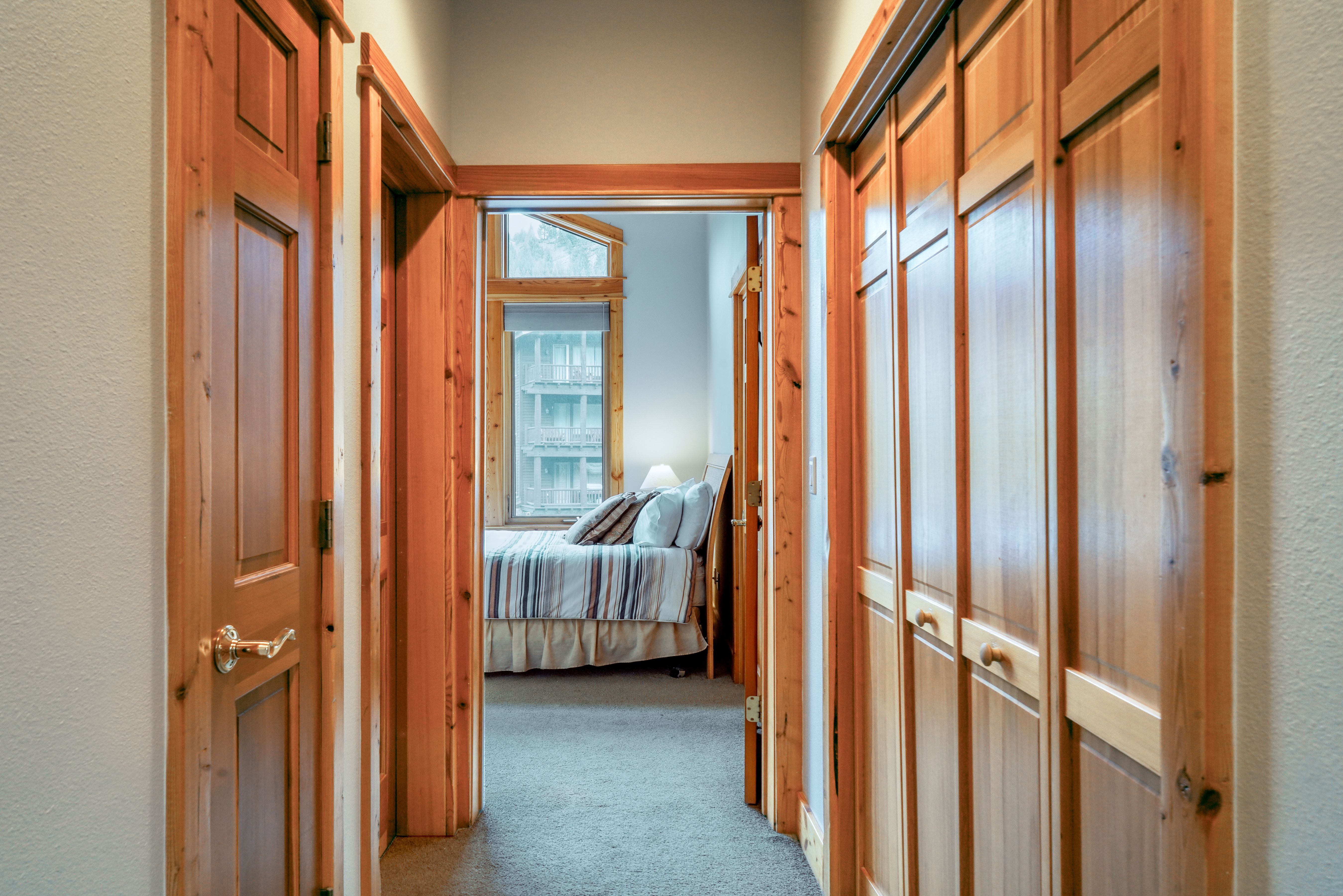 Lone Moose 210A vacation condo hallway and bedroom
