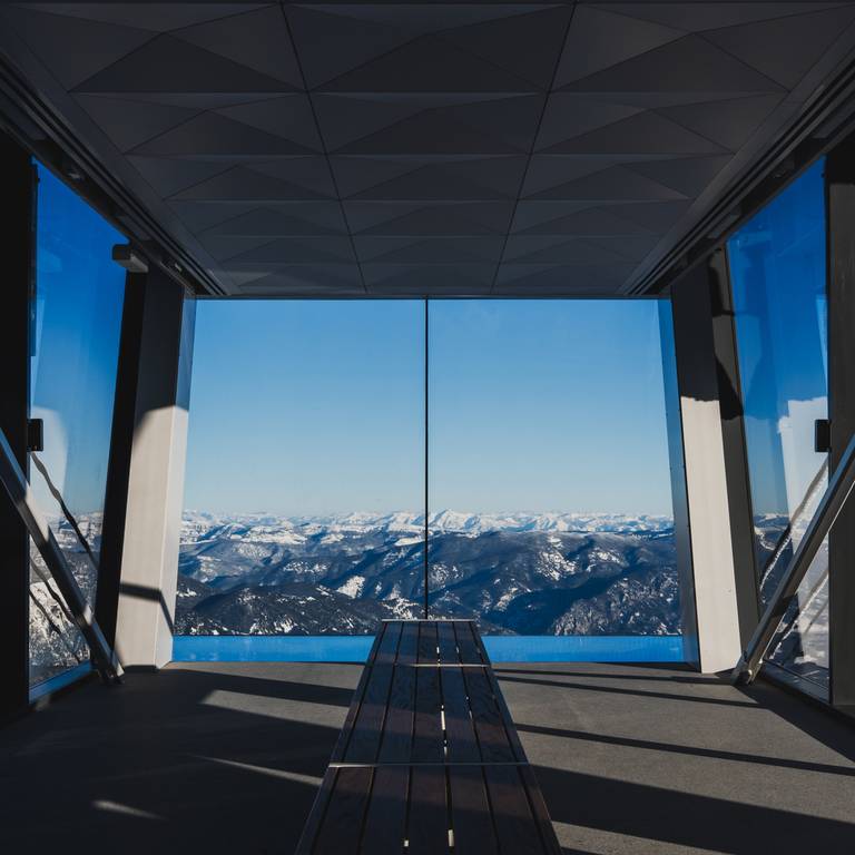View out of Kircliff with the Lone Peak Tram under the glass floor