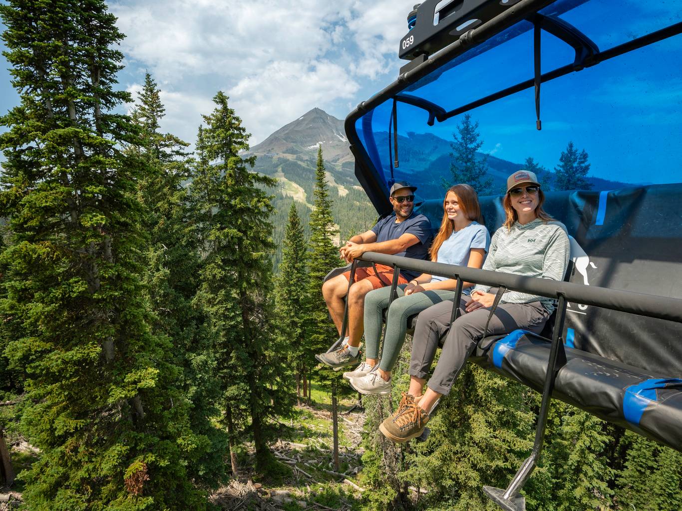 Family on a scenic chairlift ride