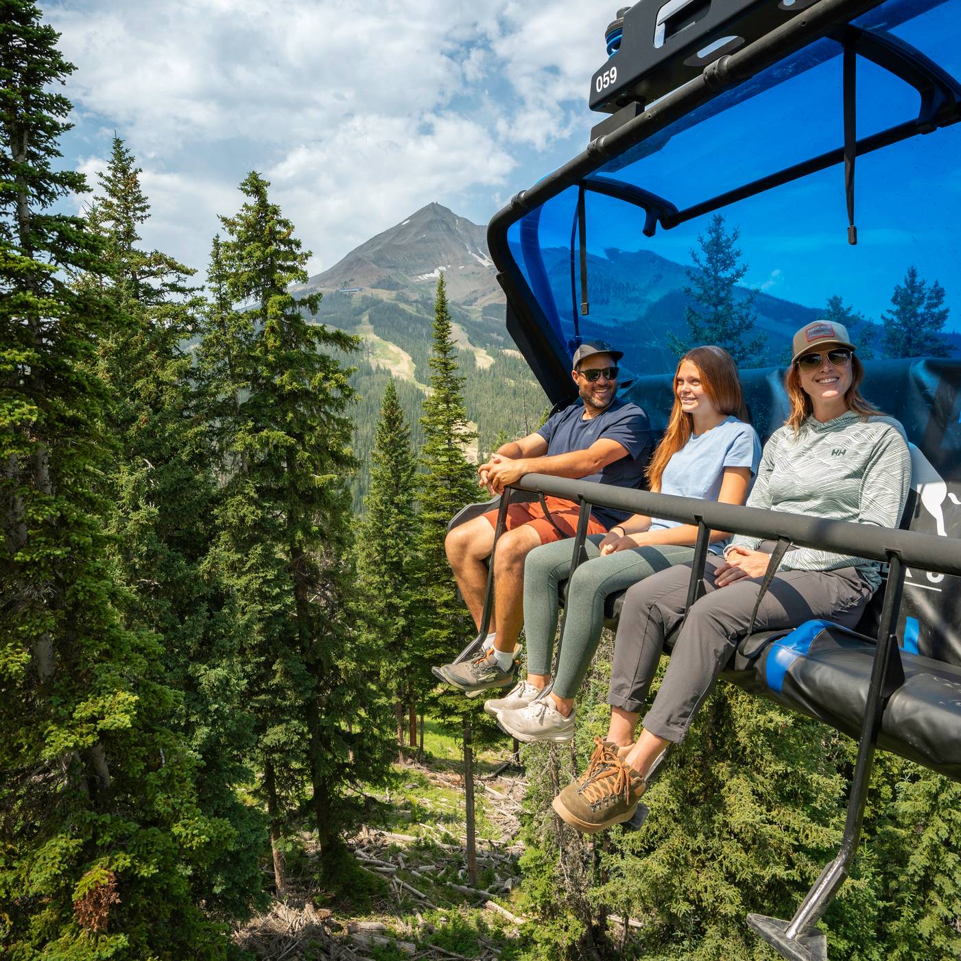 Family on a scenic chairlift ride