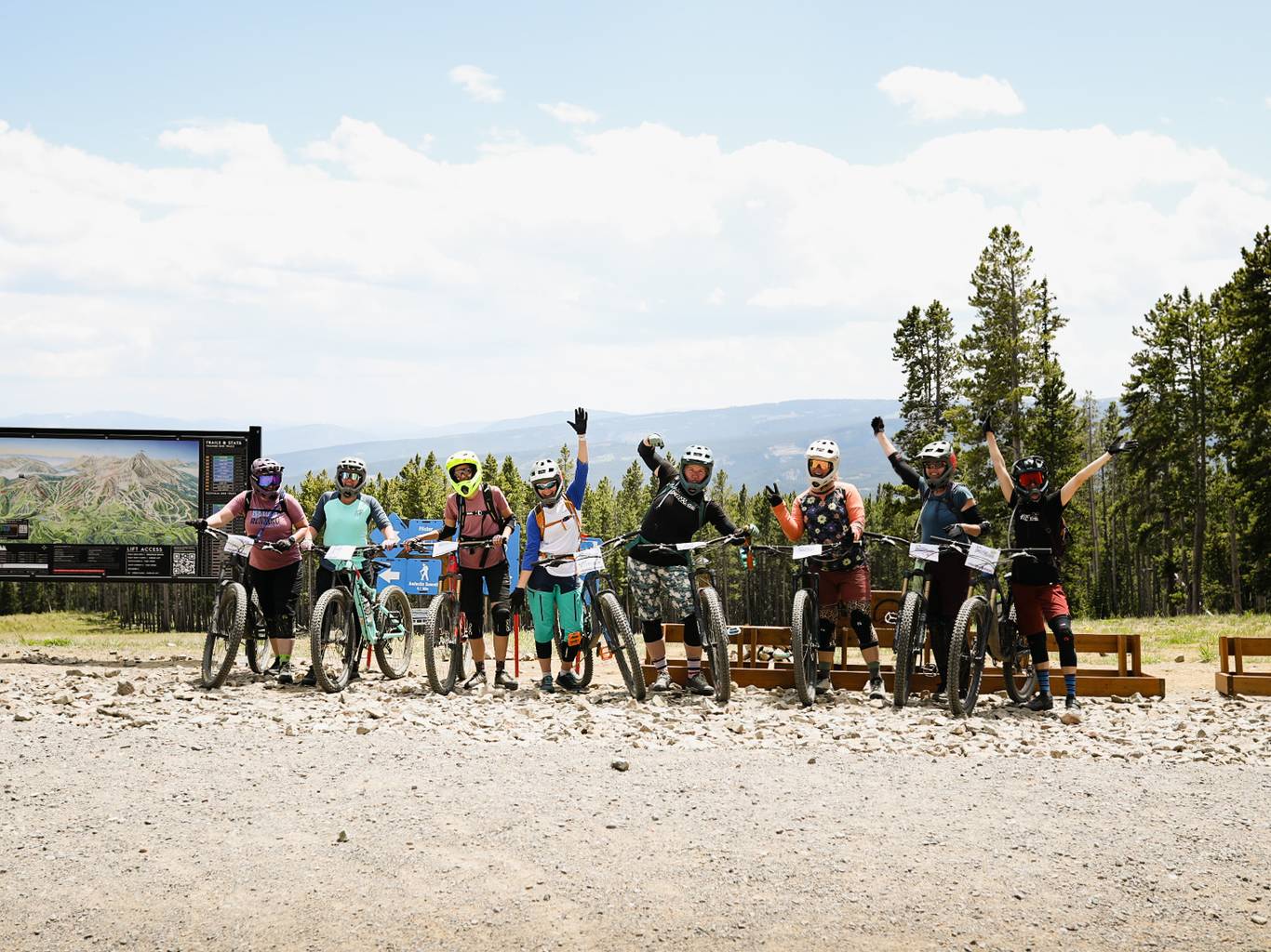 Woman riding her mountain bike around a corner