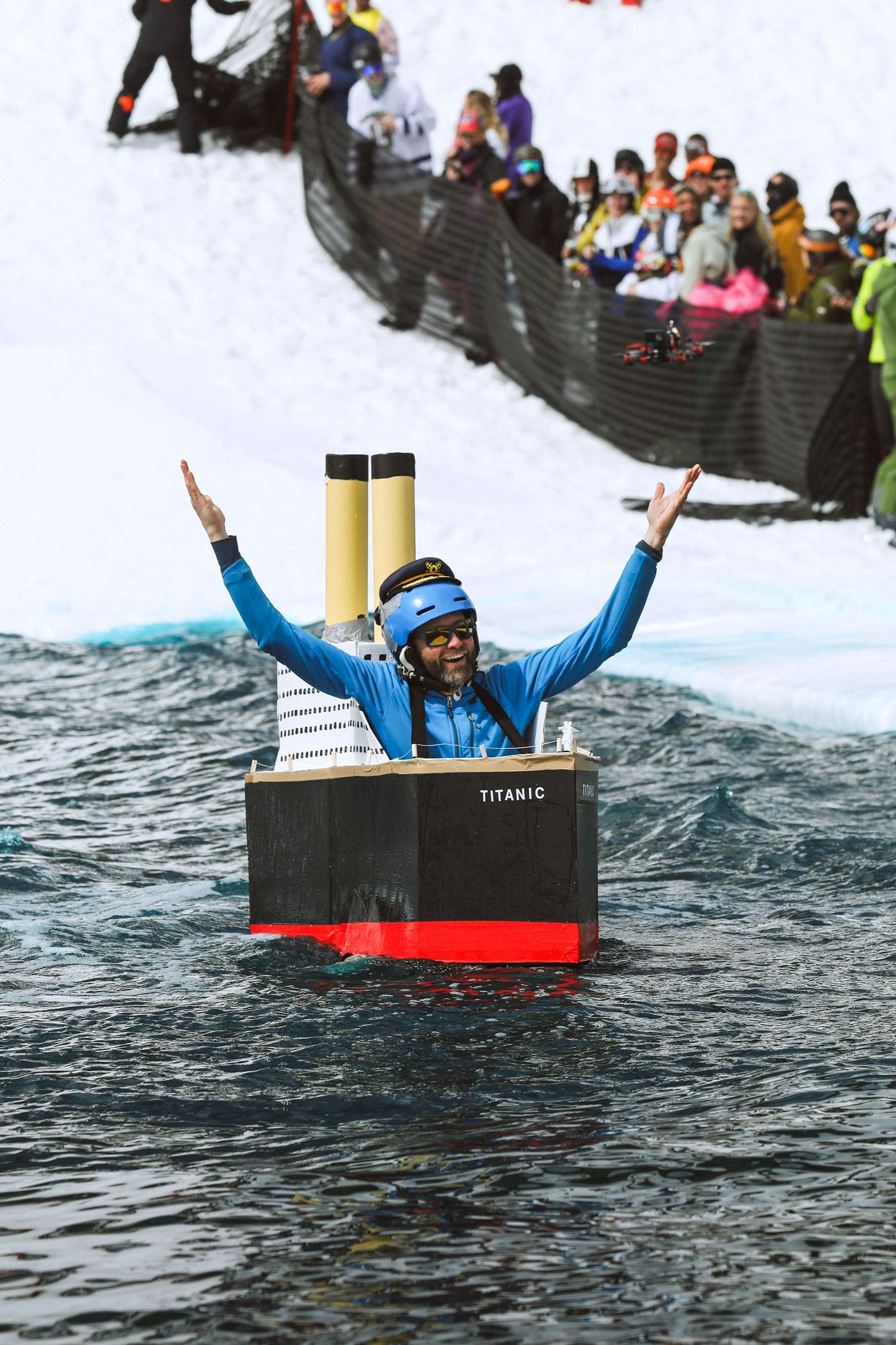 Man in a titanic costume in a pond
