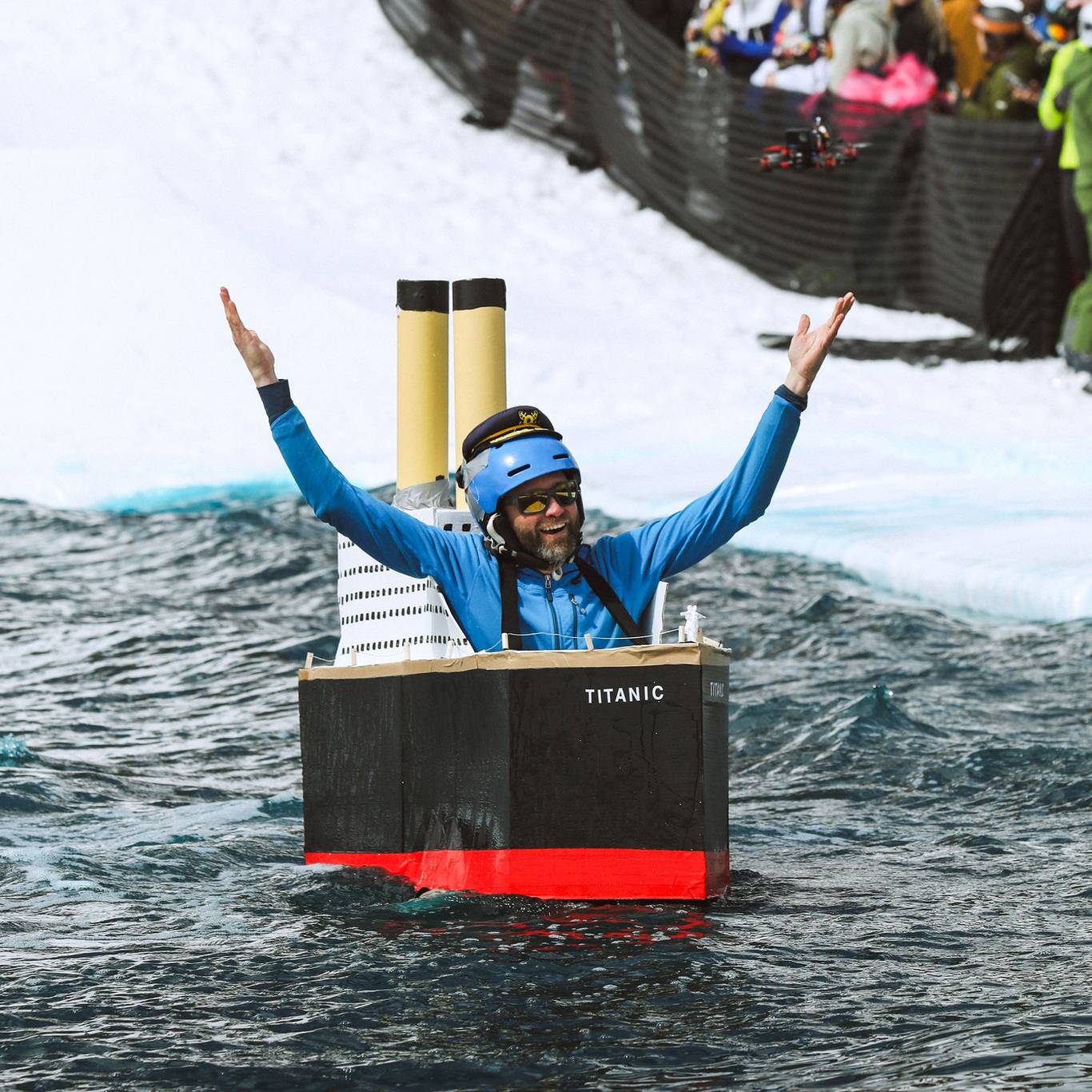 Man in a titanic costume in a pond