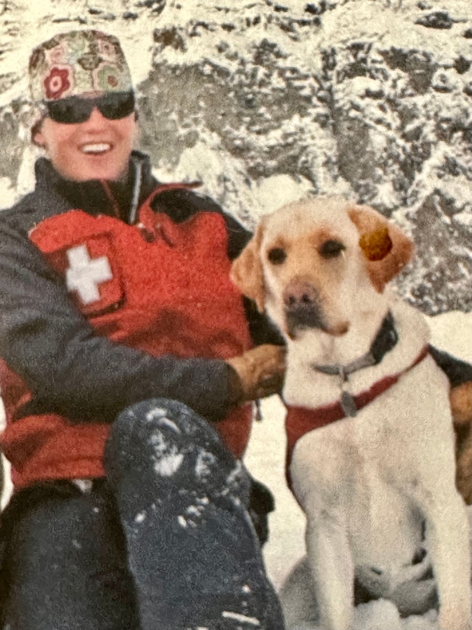 Nancy and her yellow lab patrol dog Cache in 2007