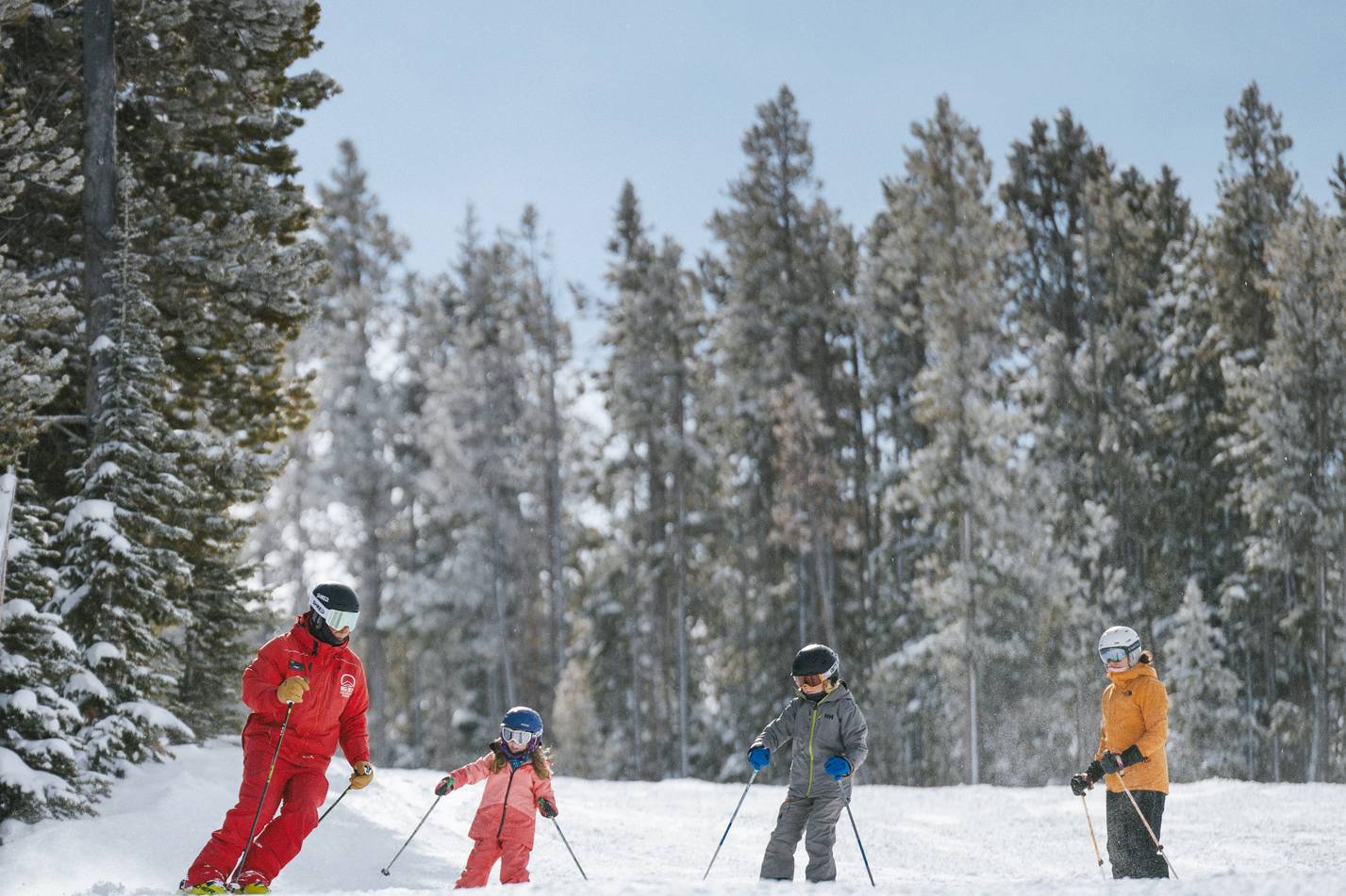 Family in with a Big Sky Resort ski instructor