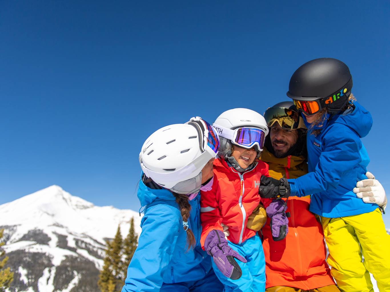 Family in ski gear