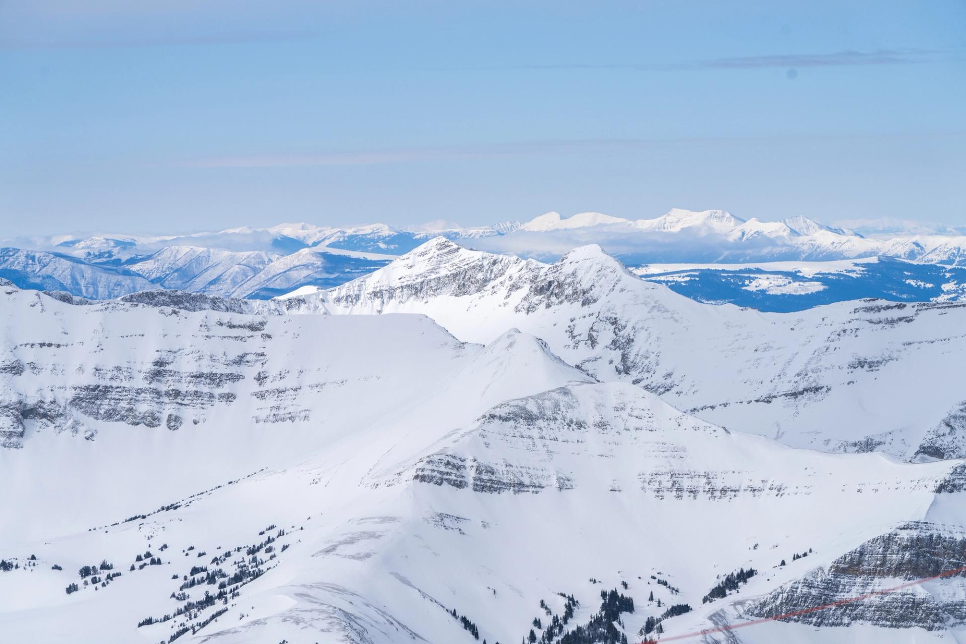 a scenic view of Sphinx and Cedar mountain from the top of Lone Peak