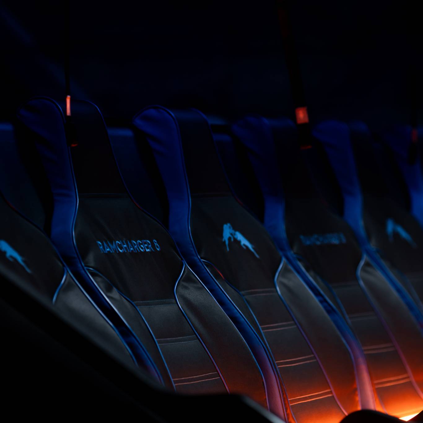 Chairlift seats with red lighting