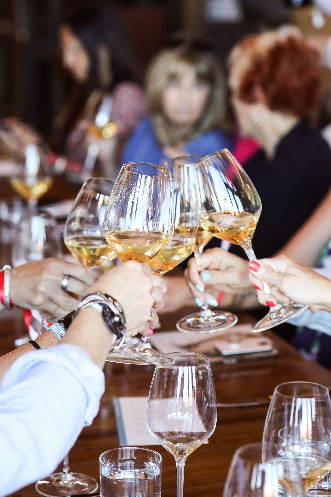 Cheersing wine glasses