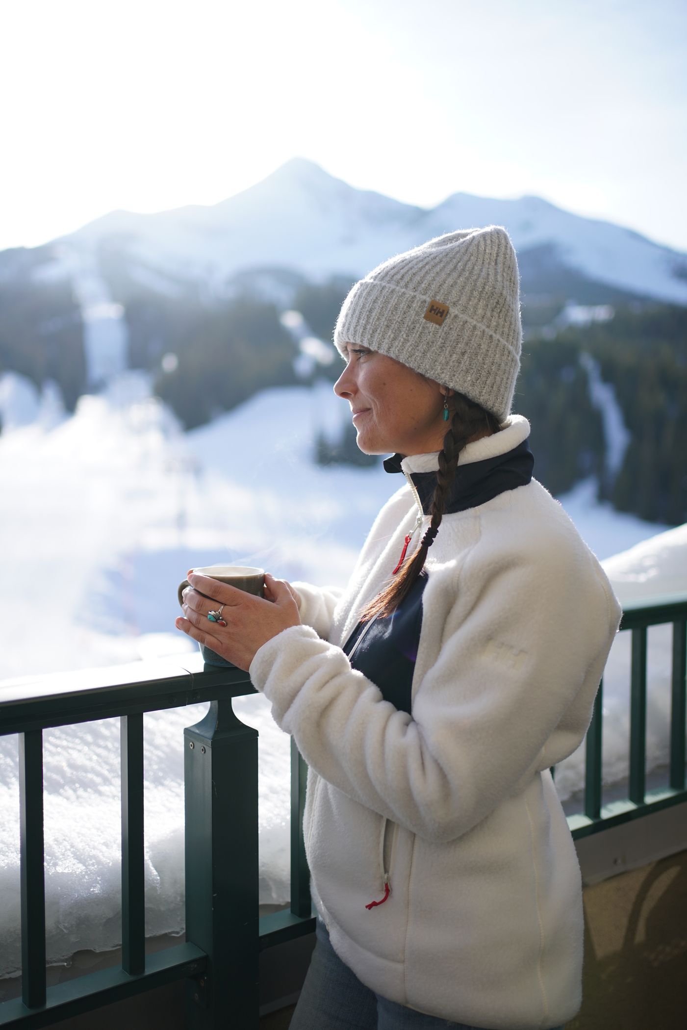 Woman on a patio drinking tea