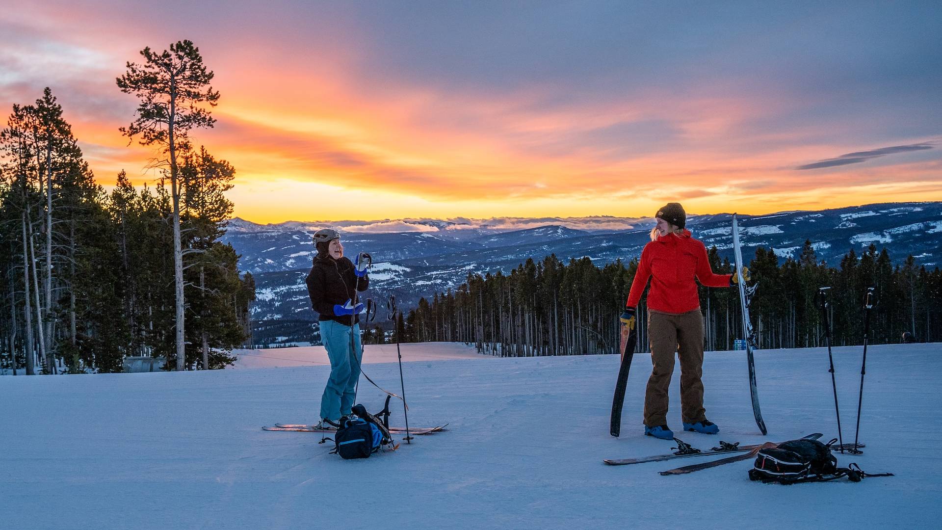 Skiers at the top of Andesite Mountain in backcountry gear