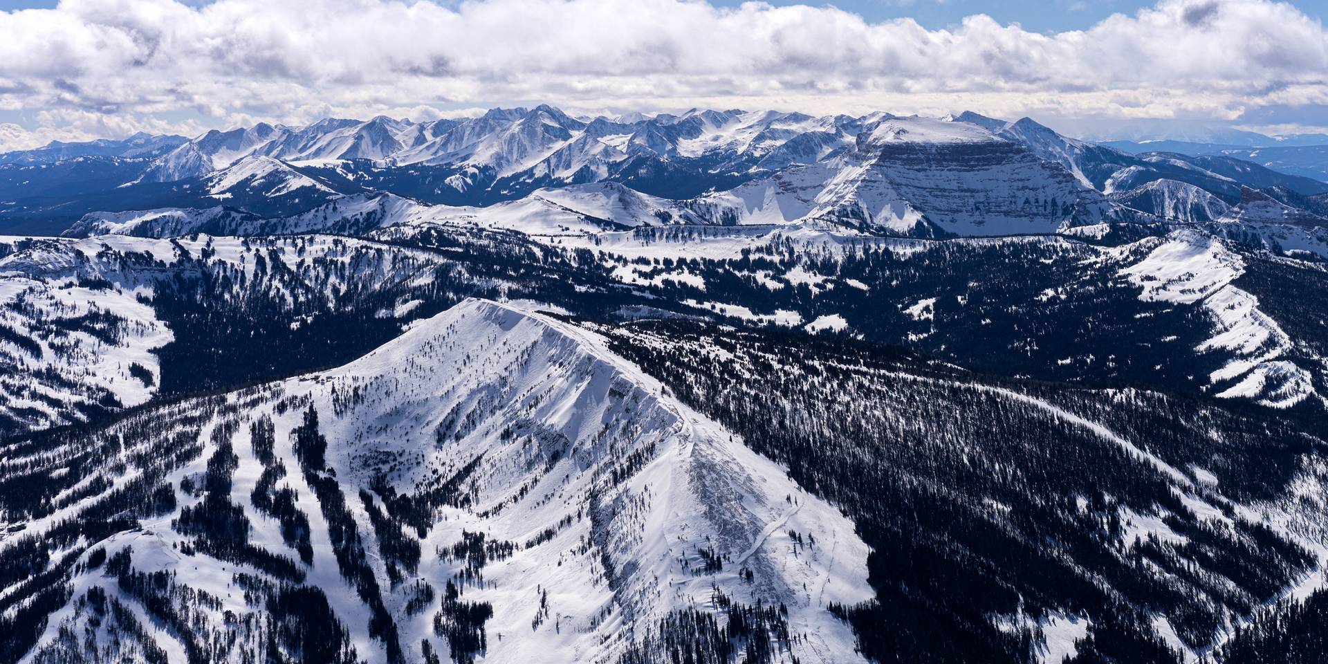 Mountain peaks on the horizon in winter