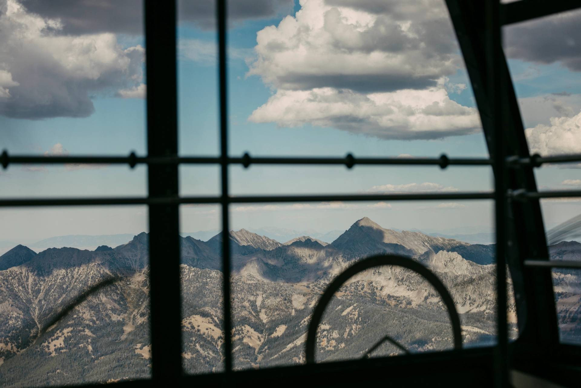 View out of the Lone Peak Tram in summer