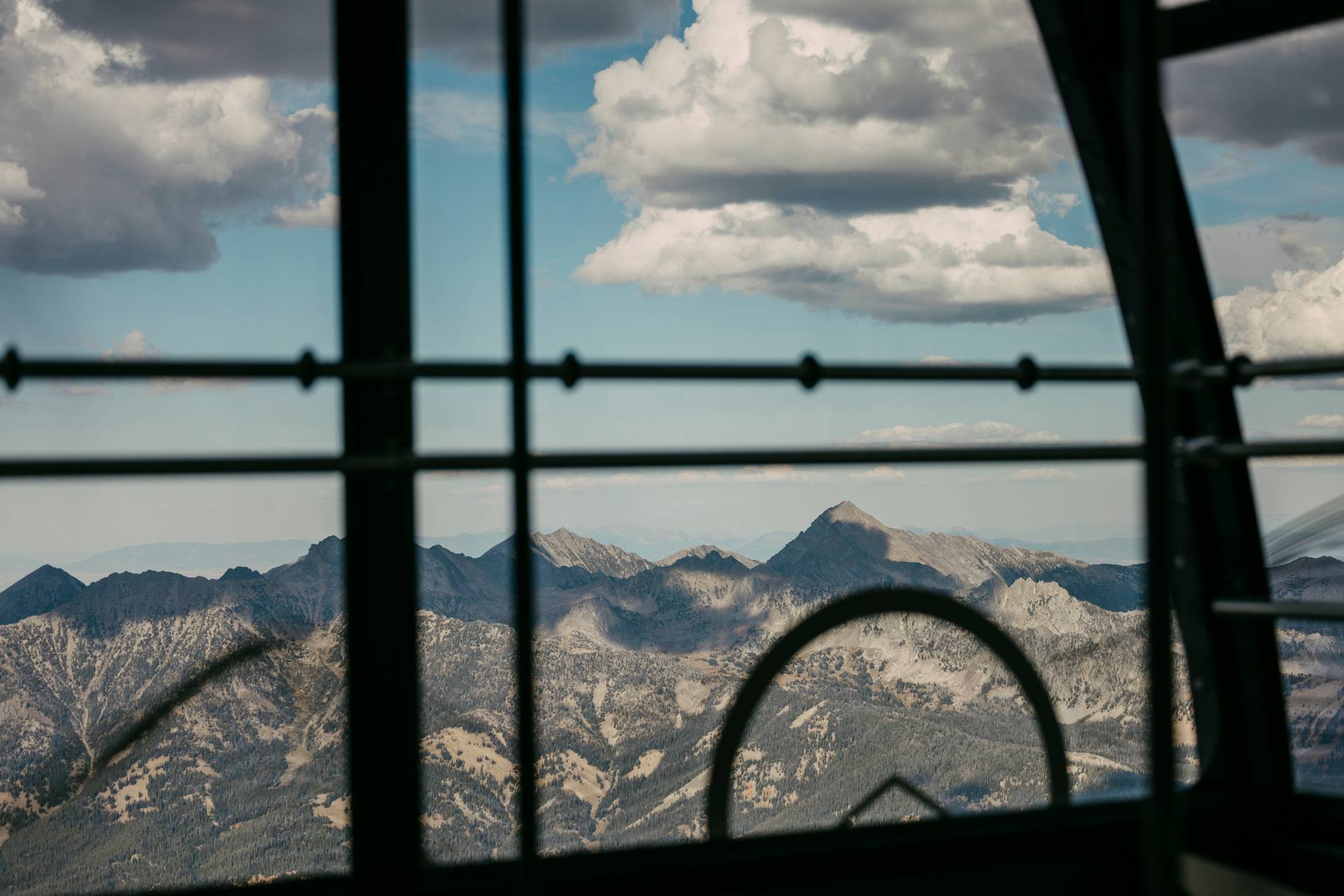 View out of the Lone Peak Tram in summer