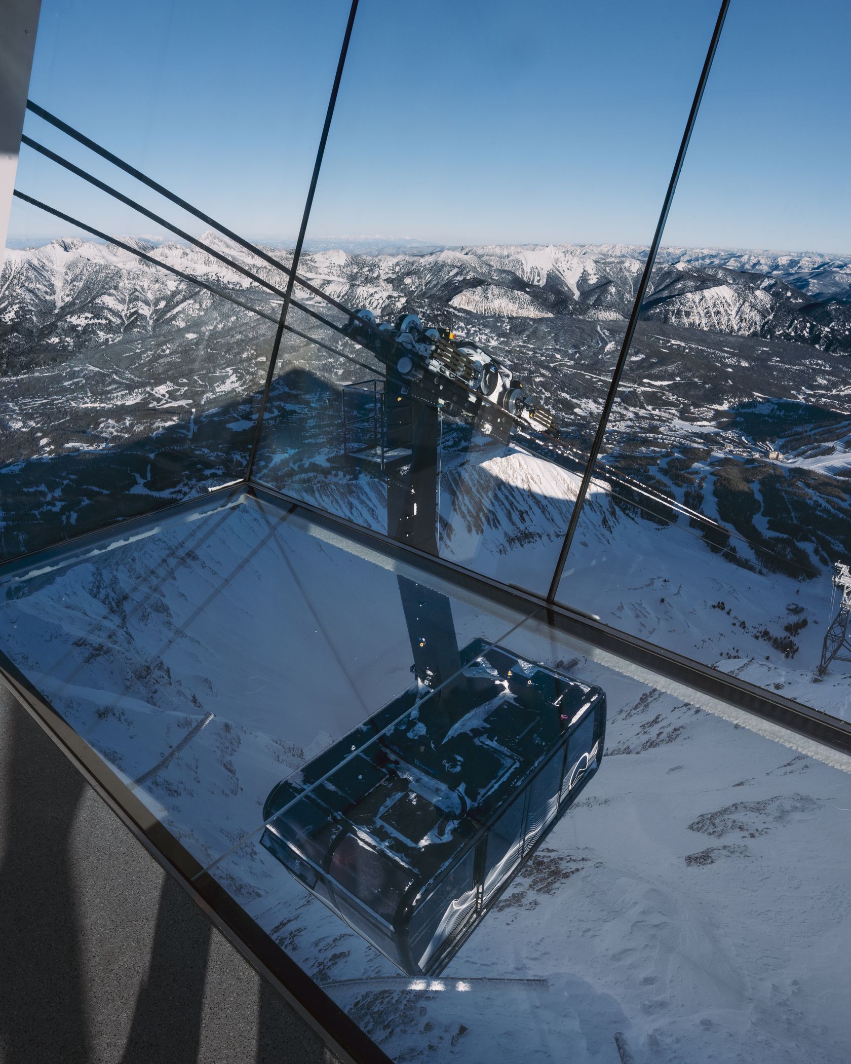 View out of Kircliff with the Lone Peak Tram under the glass floor